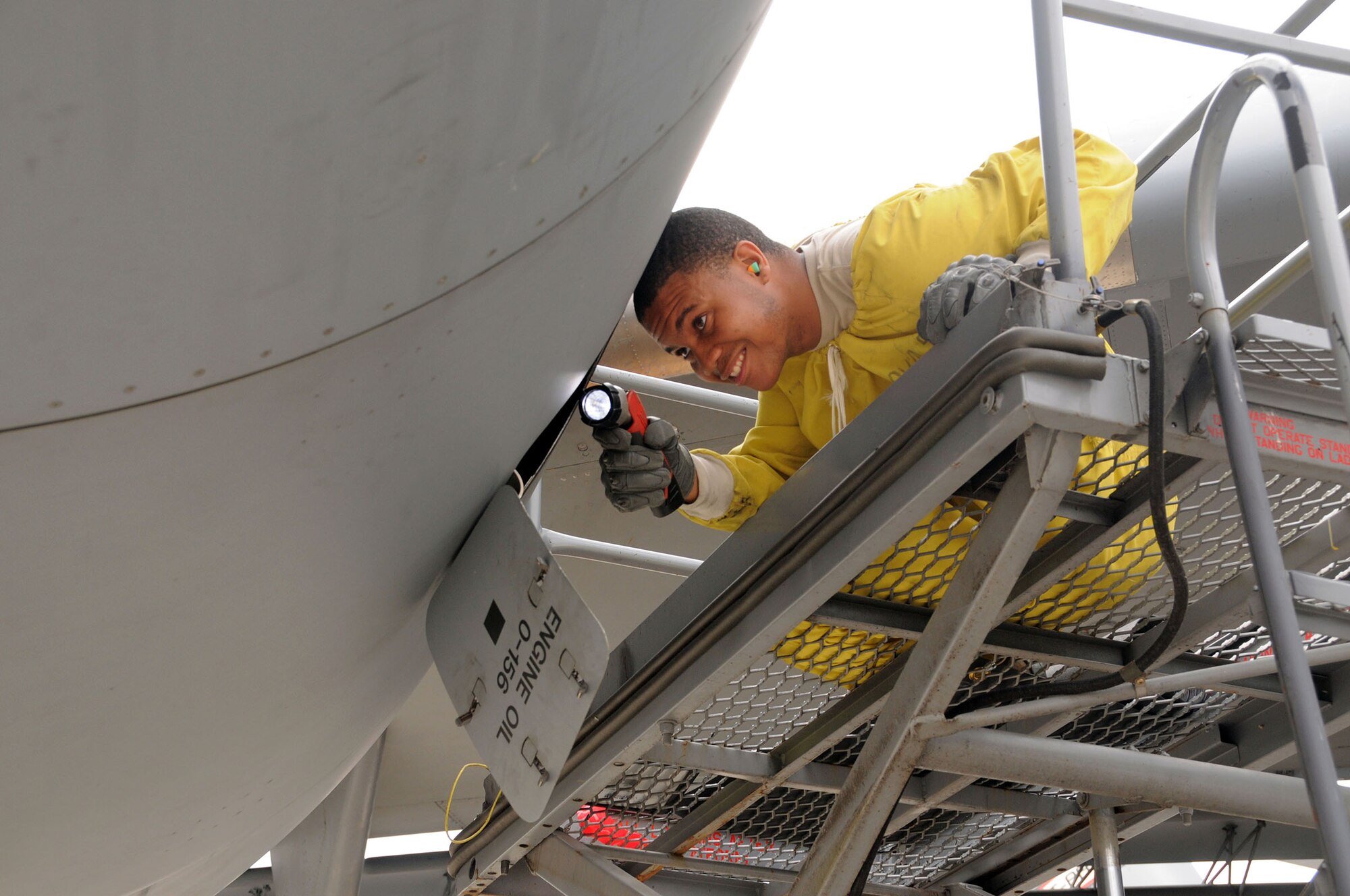 WRIGHT-PATTERSON AIR FORCE BASE, Ohio – Airman 1st Class Devaughn Blair, a jet engine specialist with the 445th Aircraft Maintenance Squadron, performs a basic post flight inspection on the #3 engine of a C-17 Globemaster III at Wright-Patterson Air Force Base, Ohio, June 6, 2015. (U.S. Air Force Photo/Tech. Sgt. Anthony G. Springer)