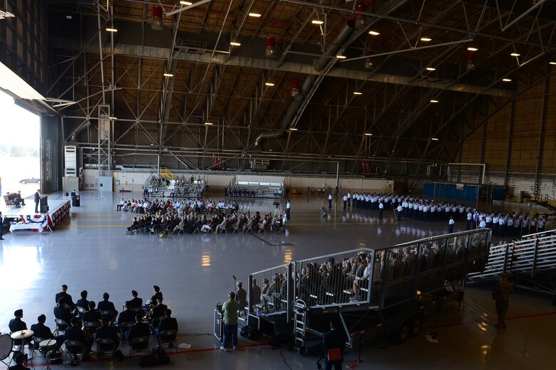 A change of command ceremony is held for the 62nd Airlift Wing, June 26, 2015 at Joint Base Lewis-McChord, Wash. Col. Leonard Kosinski assumed command and Lt. Gen. Carlton D. Everhart II, 18th Air Force commander presided over the ceremony. (U.S. Air Force photo by Staff Sgt. Tim Chacon)