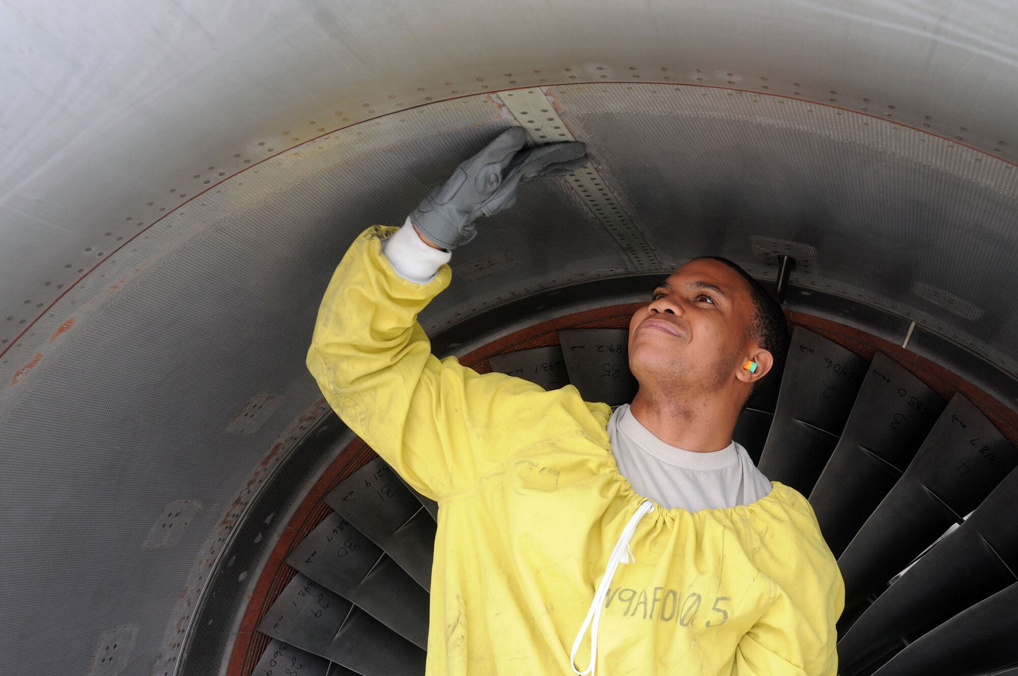 WRIGHT-PATTERSON AIR FORCE BASE, Ohio – Airman 1st Class Devaughn Blair, a jet engine specialist with the 445th Aircraft Maintenance Squadron, performs a basic post flight inspection on the #3 engine of a C-17 Globemaster III at Wright-Patterson Air Force Base, Ohio, June 6, 2015. (U.S. Air Force Photo/Tech. Sgt. Anthony G. Springer)