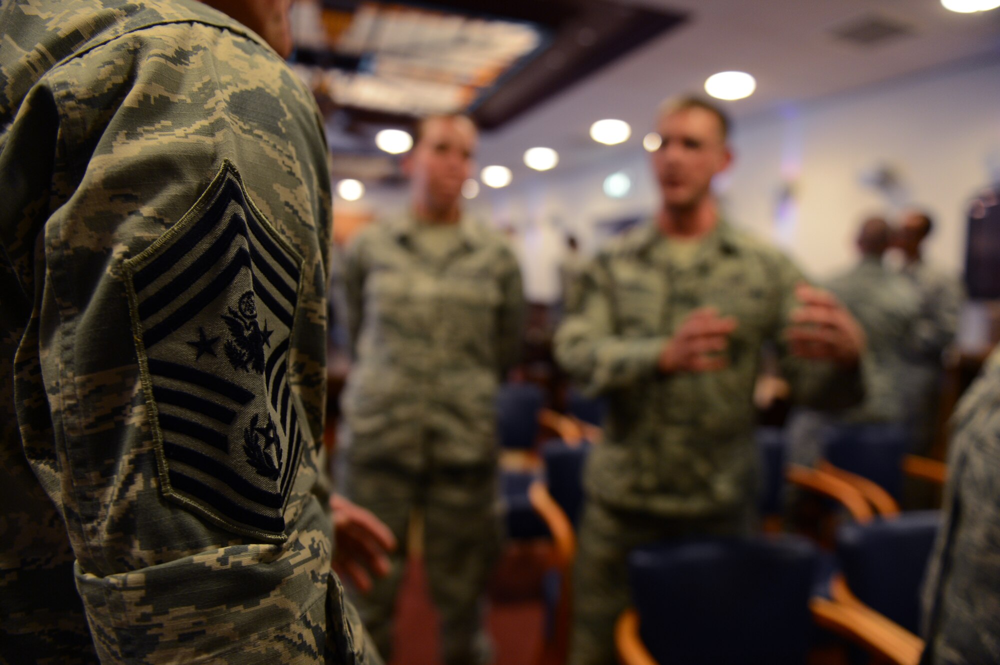 U.S. Air Force Chief Master Sgt. of the Air Force James Cody speaks with Airmen after an all-call at Volkel Air Base, the Netherlands, June 23, 2015. Approximately 70 Airmen attended the event, where they asked Cody questions about current topics in the Air Force. (U.S. Air Force photo by Senior Airman Gustavo Castillo/Released) 