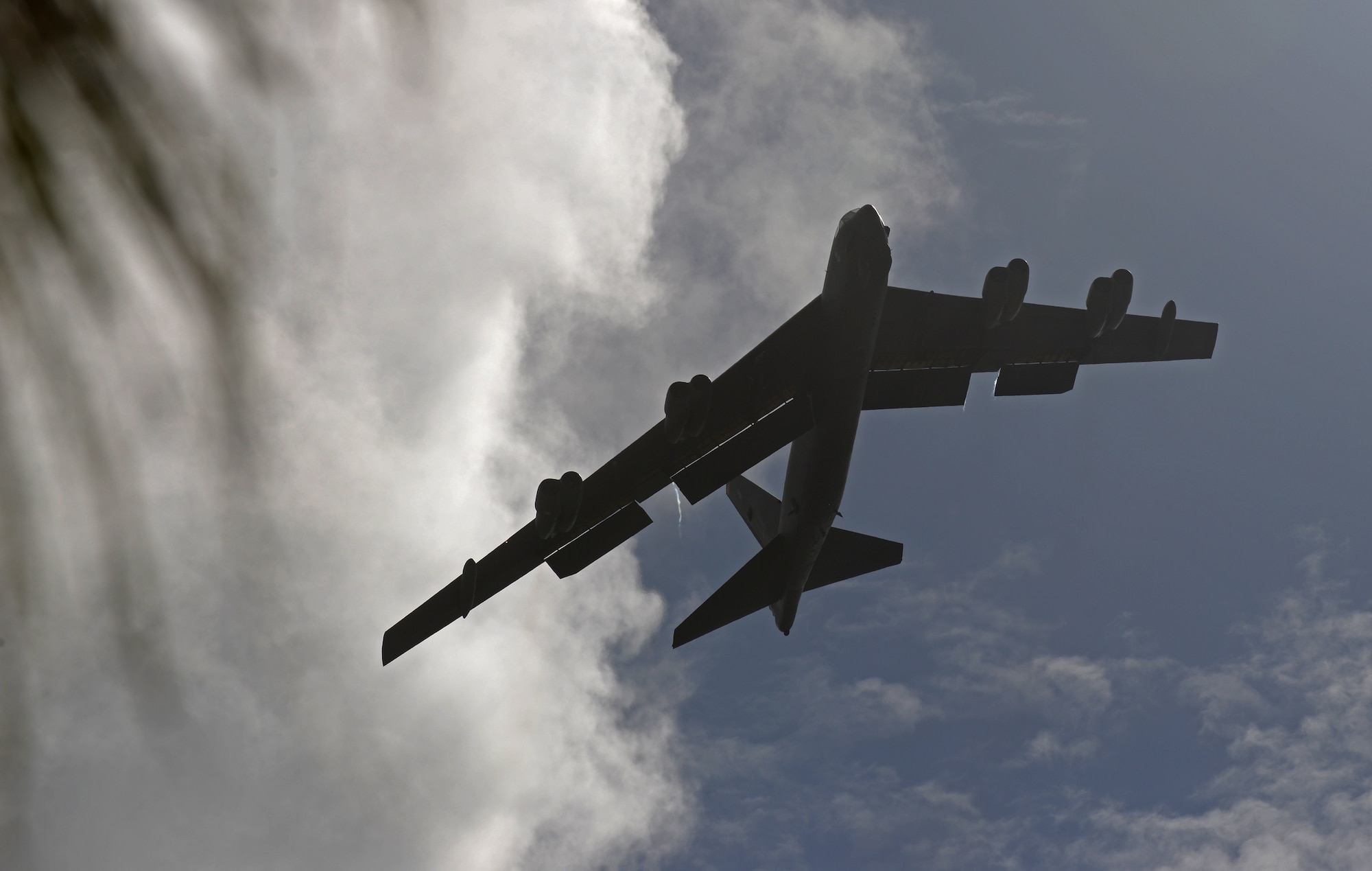 A B-52 Stratofortress approaches for a low flyover in honor of Col. Reid Langdon, 36th Operations Group commander, June 25, 2015, at Andersen Air Force Base, Guam. The training mission marked Langdon’s final flight as a master navigator in the B-52. (U.S. Air Force photo by Senior Airman Alexander W. Riedel/Released)