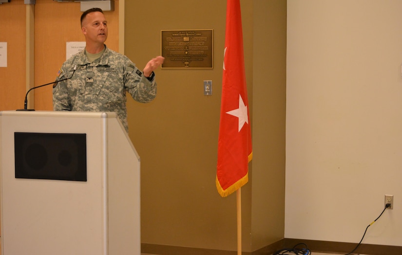 Col. Bradly M. Boganowski addresses the 800th Logistics Support Brigade for the first time as the commander during a change of command ceremony, Mustang, Okla., June 28, 2015. Boganowski replaced Col. Howard C. W. Geck as commander.