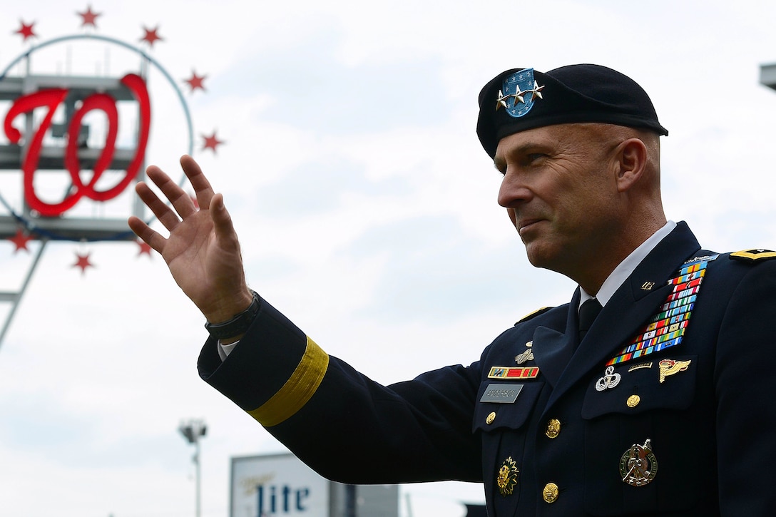 Army Lt. Gen. Joseph Anderson participates in Army Day events before a Washington Nationals-Atlanta Braves baseball game at Nationals Park in Washington, D.C., June 25, 2015. Anderson delivered the game ball during the pregame military salute that also included a re-enlistment ceremony, soldier cordon, color guard presentation and performance by the Fife and Drum Corps. Sgt. Maj. of the Army Daniel A. Dailey threw the ceremonial first pitch.