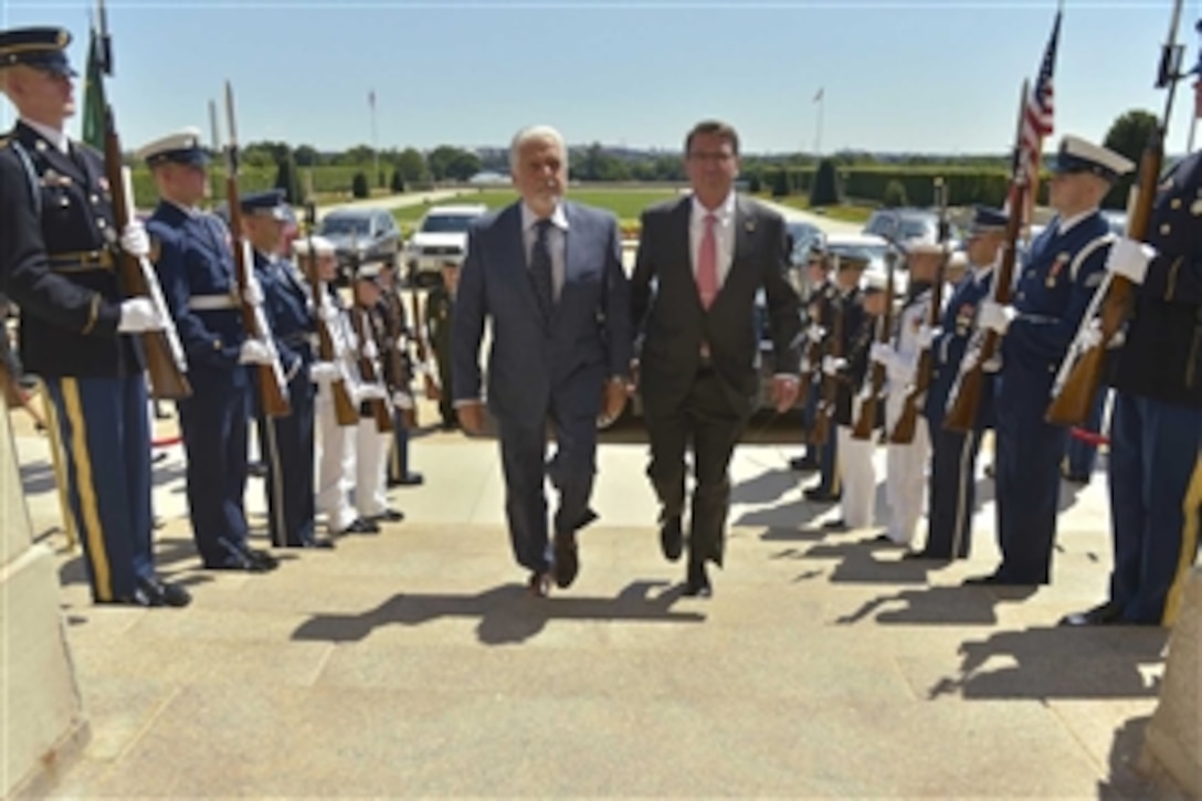 U.S. Defense Secretary Ash Carter, right, hosts an honor cordon to welcome Brazilan Defense Minister Jaques Wagner to the Pentagon, June 29, 2015. The two defense leaders met to discuss matters of mutual importance.