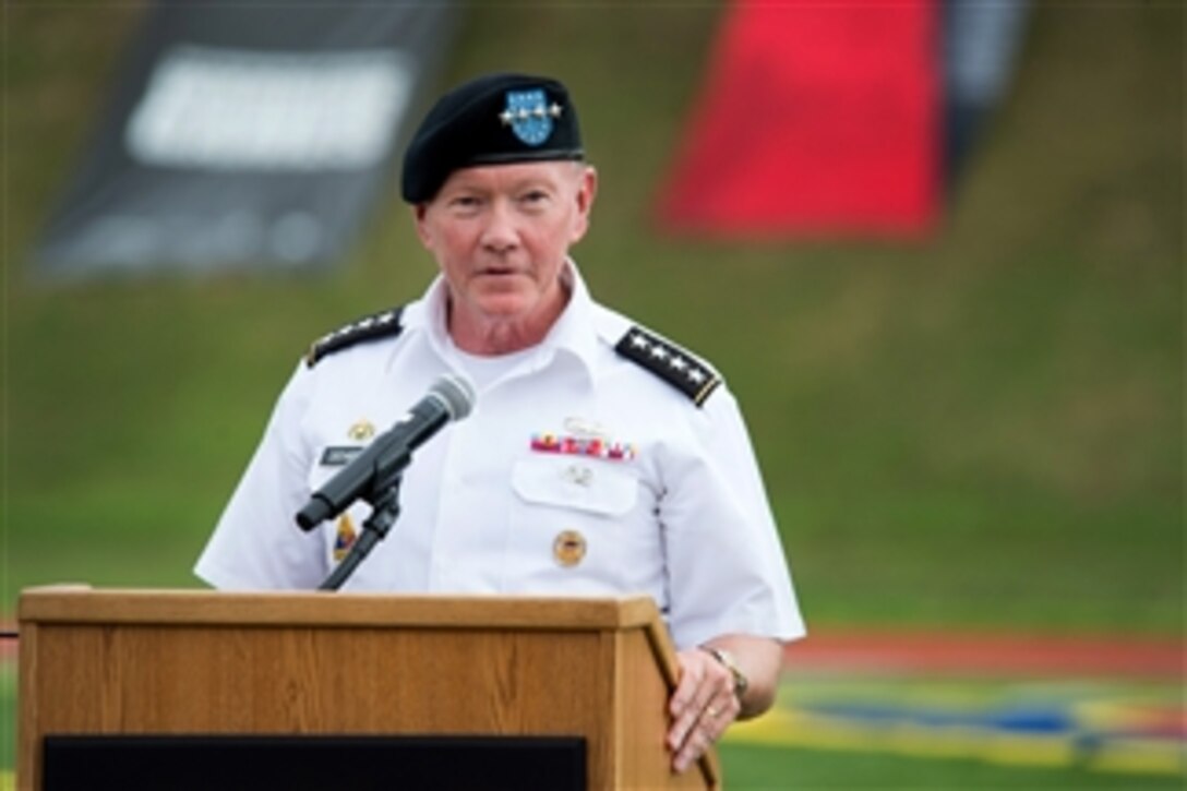 Army Gen. Martin E. Dempsey, chairman of the Joint Chiefs of Staff, delivers remarks to U.S. and British athletes, family members and other attendees at the closing ceremony of the 2015 Department of Defense Warrior Games on Marine Corps Base Quantico, Va., June 28, 2015.