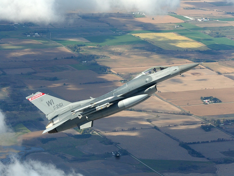 F-16 Aircraft #87-261 from the Wisconsin Air National Guard's 115th Fighter Wing in Madison, Wis. intercepts a simulated non-responsive civilian aircraft during a Fertile Keynote Exercise Oct.18, 2011. The exercise tests the readiness of personnel assigned to the Air Control Alert mission, to rapidly respond to potential aircraft threats approaching or operating within U.S. or Canadian airspace. (Photo by Capt. David Berget, Lacrosse Composite Squadron, Wisconsin Wing Civil Air Patrol)