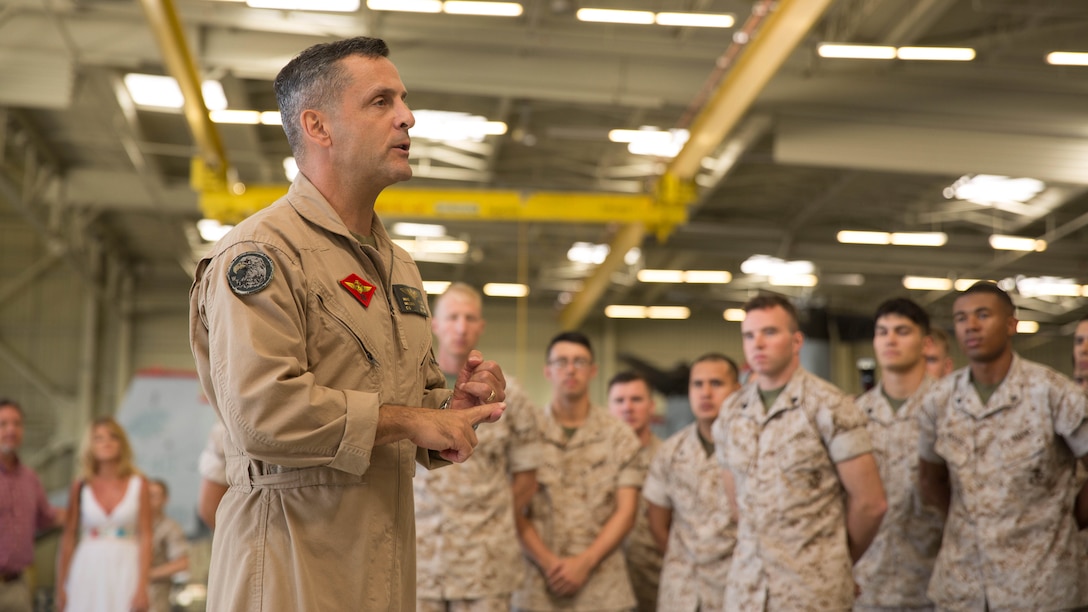 Maj. Gen. Michael Rocco, commanding general of 3rd Marine Aircraft Wing, speaks to Marines after an award ceremony inside Hangar 6 aboard Marine Corps Air Station Miramar, Calif., June 25, 2015. A team of twenty-four Marines from Marine Tiltrotor Squadron 166, VMM-268 and VMM-364 received awards for playing a role in returning a grounded MV-22 Osprey to operational flight status.