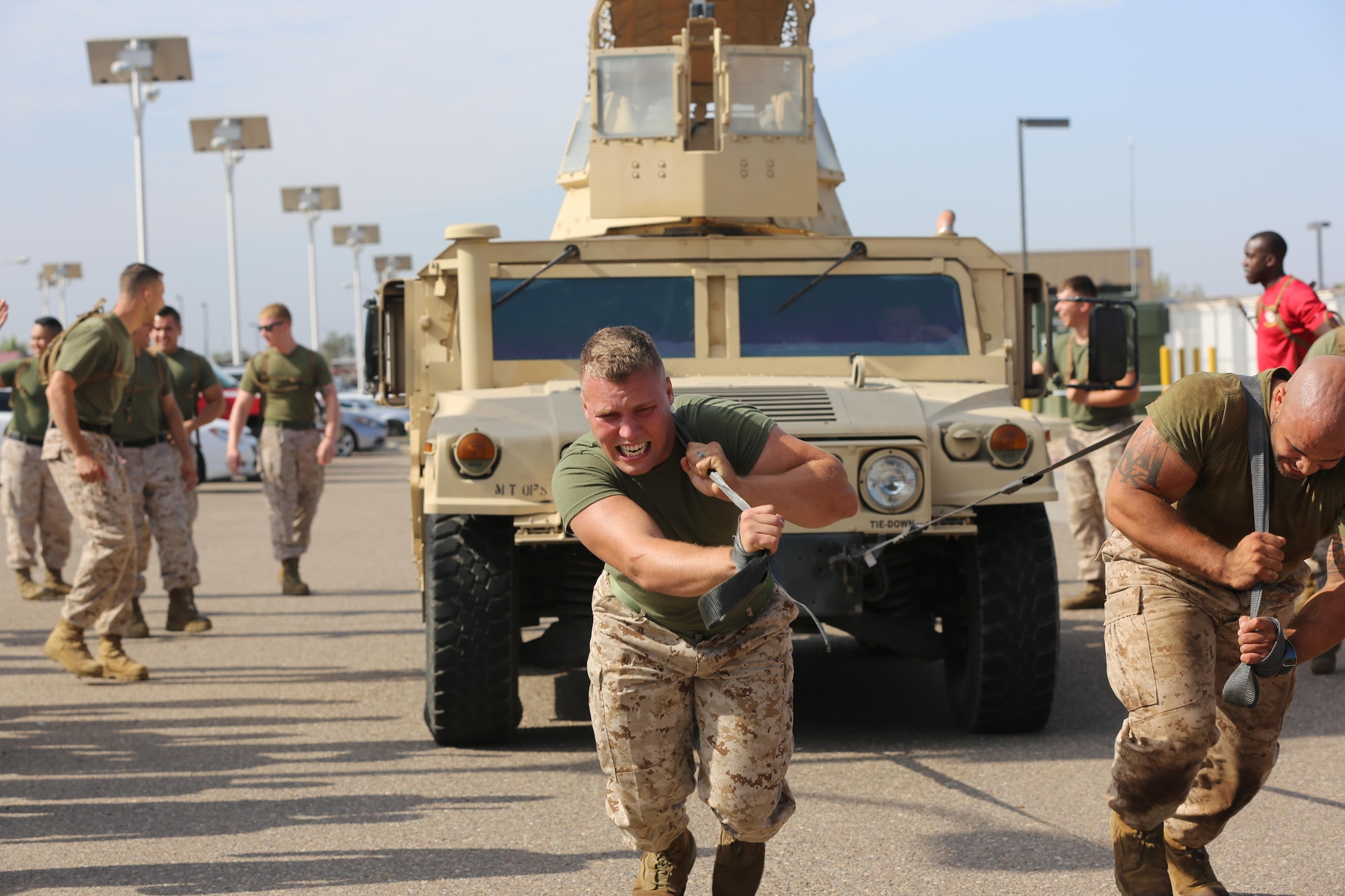 Marines with Marine Wing Support Squadron (MWSS) 373 participate in the Humvee-pull event during the MWSS-373 Field Meet aboard Marine Corps Air Station Miramar, California, June 26. The field meet commemorates the birthday of the unit. 