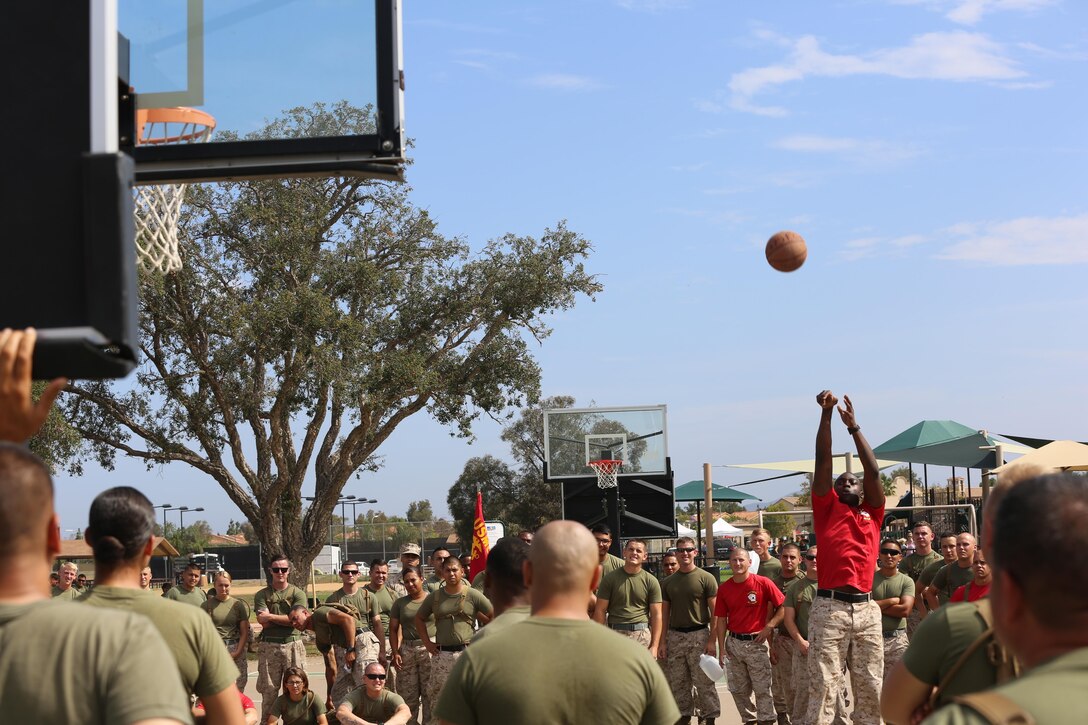 Marines with Marine Wing Support Squadron (MWSS) 373 participate in a basketball competition during the MWSS-373 Field Meet aboard Marine Corps Air Station Miramar, California, June 26. The field meet commemorates the birthday of the unit. 