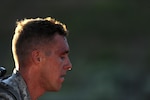 Spc. Cruser Barnes, a cavalry scout with the Hawaii Army National Guard’s Troop A, 1st Squadron, 299th Cavalry Regiment, rests for a moment while participating in the ruck march event of the 2015 Army National Guard Best Warrior Competition at Camp Williams, Utah,  June 23, 2015. Barnes was named the 2015 Army National Guard Soldier of the Year at the end of the competition, which tested competitors on a variety of tactical and technical skills over a physically and mentally demanding three days. Army Sgt. Robert Cunningham, a combat engineer with the West Virginia Army National Guard's159th Engineer Company (Sapper) was named the Amry Guard's NCO of the Year. 