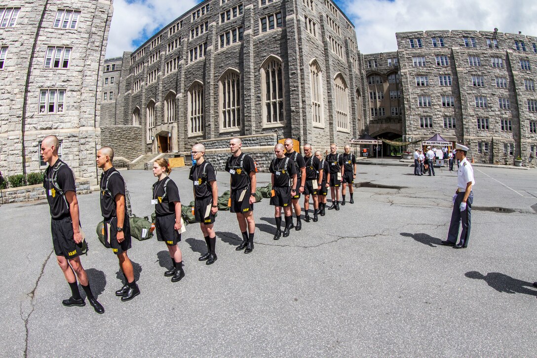 Future cadets arriving at the United States Military Academy at West Point are given an initial class in drill and ceremony by a Cow, or cadet in their third year at the Academy, on R-day. Almost 1,300 future cadets reported to the Academy on R-day, which is typically held on the last Monday in June. After arriving at the Academy, the future cadets are ushered into Thayer Hall where they are fitted for uniforms and processed into the Academy. ()