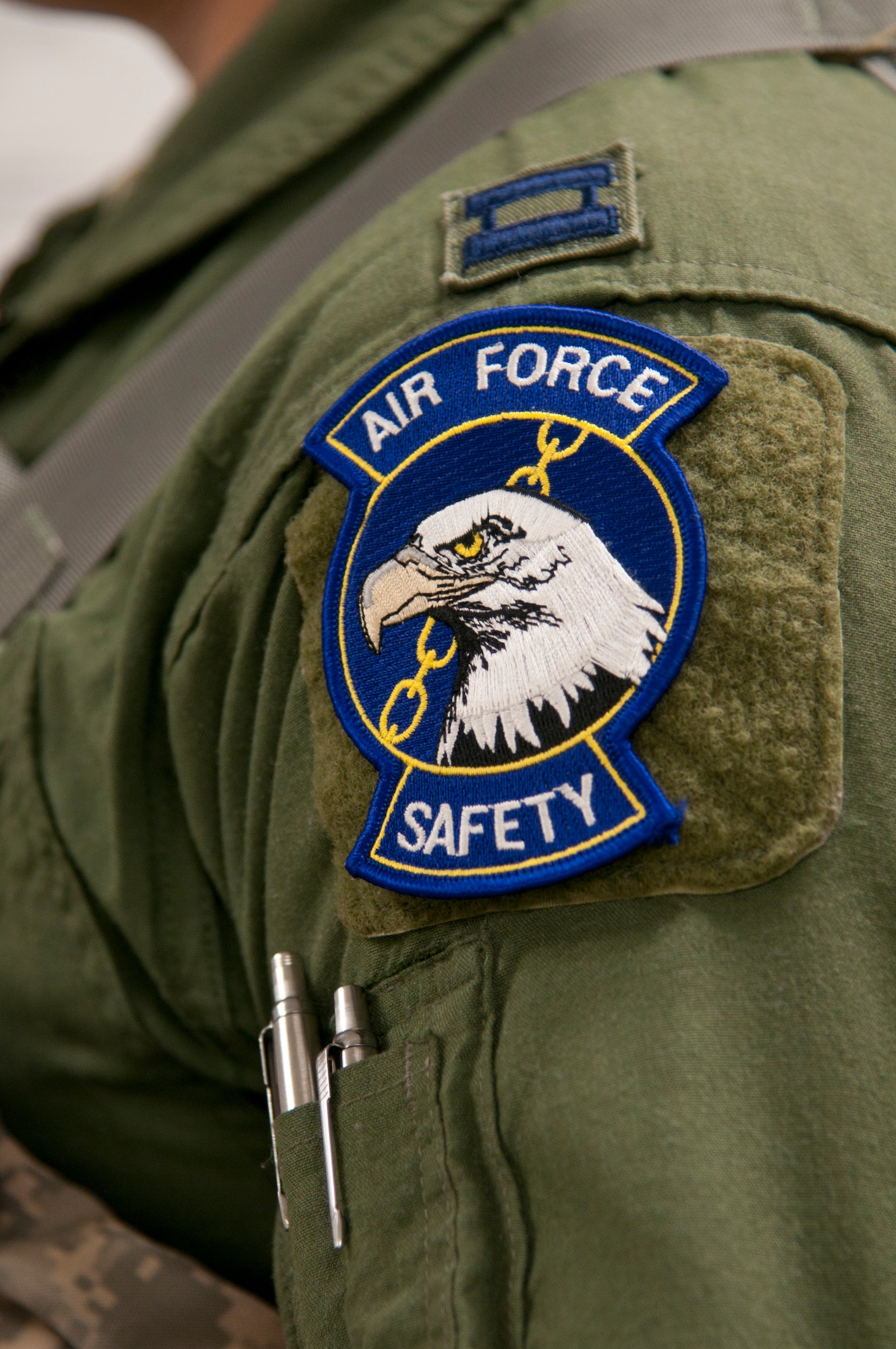 Capt. Michael Carter, 582nd Helicopter Group flight safety officer, wears the Air Force Safety showing his connection and duty to keeping his fellow Airmen protected. It is the responsibility of Air Force flight safety officers to provide the proper tools and information to ensure the safety of aircrews. (U.S. Air Force photo by Airman 1st Class Malcolm Mayfield)