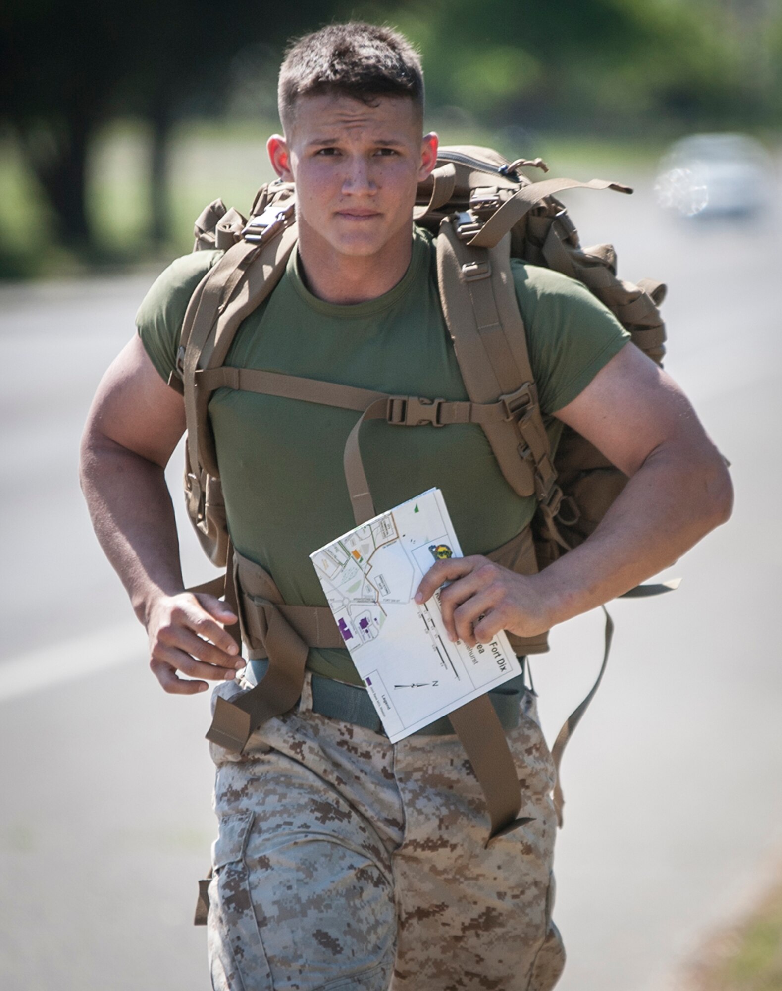 U.S. Marine Corps Lance Cpl. Albert Martino, Marine Aircraft Group 49, runs during the urban orienteering portion of the Joint Base Service Member of the Year Competition May 14, 2015 at Joint Base McGuire-Dix-Lakehurst N.J. This was the first annual competition and featured eight competitors, two each from the U.S. Army, Marines Corps, Navy and Air Force. Martino won in the junior enlisted category. (U.S. Air Force photo by Senior Airman Scott Saldukas)