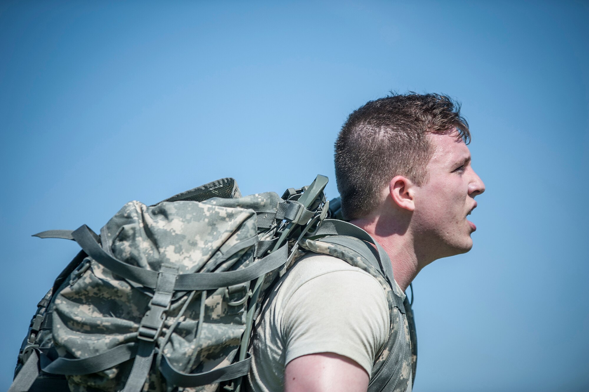 U.S. Air Force Staff Sgt. Jonathan Hood, 6th Airlift Squadron, runs during the urban orienteering portion of the Joint Base Service Member of the Year Competition May 14, 2015 at Joint Base McGuire-Dix-Lakehurst N.J. This was the first annual competition and featured eight competitors, two each from the U.S. Army, Marines Corps, Navy and Air Force. (U.S. Air Force photo by Senior Airman Scott Saldukas)