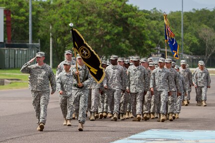 Lt. Col. Brian Henderson, Army Forces Battalion commander, renders a salute while leading ARFOR during a “Pass in Review” at the Joint Task Force – Bravo change of command ceremony June 30, 2015, at Soto Cano Air Base, Honduras. ARFOR is one of five major subordinate commands at JTF-Bravo and provides a wide variety of expeditionary capabilities. (U.S. Air Force photo by Martin Chahin)