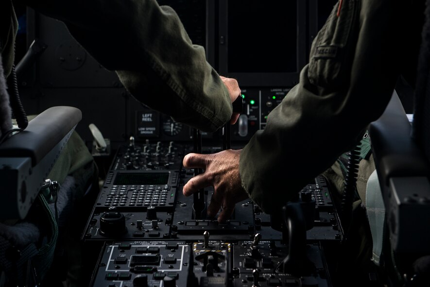 U.S. Air Force Lt. Col. Sean Hosey, right, 71st Rescue Squadron commander, ensures Col. Chad Franks, 23d Wing commander, maintains proper speed for take-off in an HC-130J Combat King II during Franks fini-flight June 26, 2015, at Moody Air Force Base, Ga. After a brief orientation to the flight controls, Franks flew four touch-and-go’s before switching to an HH-60G Pave Hawk. (U.S. Air Force photo by Senior Airman Ryan Callaghan/Released)
