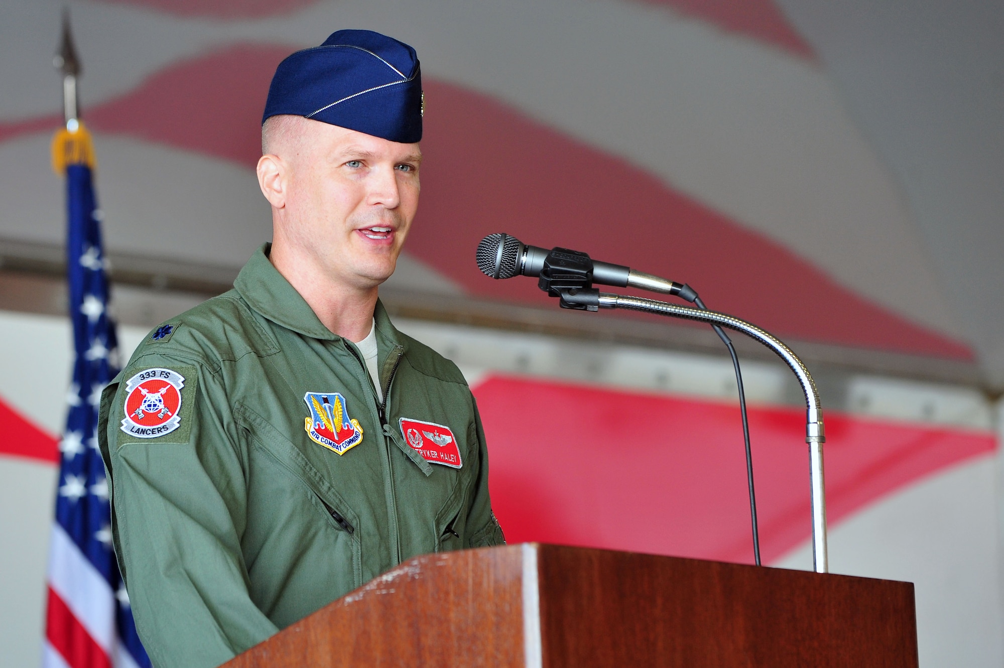 Lt. Col. Don Haley, incoming 333rd Fighter Squadron commander, addresses Airmen during the 333rd FS change of command ceremony, June 30, 2015, at Seymour Johnson Air Force Base, North Carolina. Haley previously served as the 48th Fighter Wing chief of advance programs and 492nd FS director of operations at Royal Air Force Lakenheath, England. (U.S. Air Force photo/Senior Airman John Nieves Camacho)