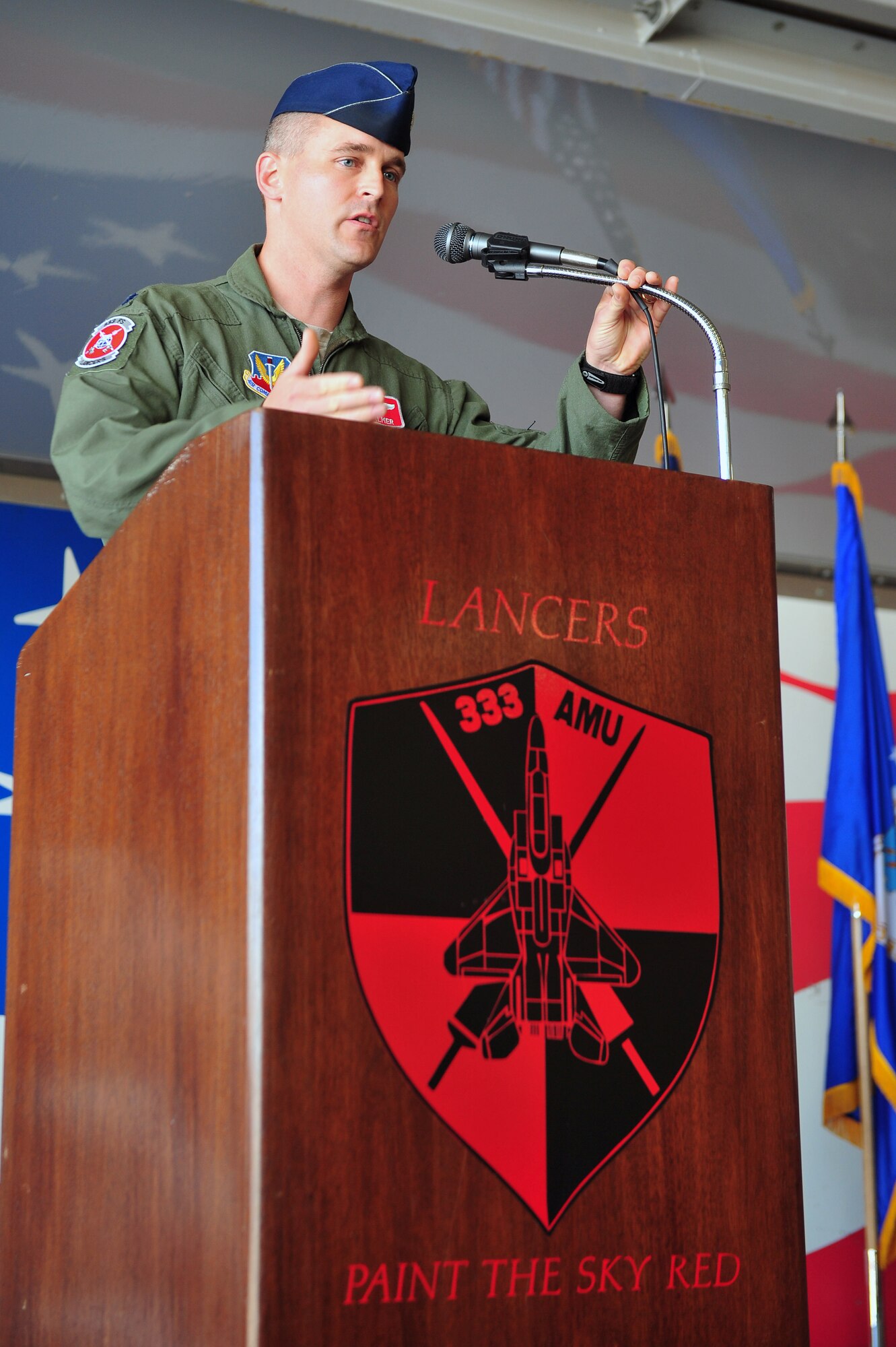 Lt. Col. Thomas Palmer, outgoing 333rd Fighter Squadron commander, delivers a speech during the 333rd FS change of command ceremony, June 30, 2015, at Seymour Johnson Air Force Base, North Carolina. Palmer will depart the 333rd FS to attend the Air War College at Maxwell AFB, Alabama. (U.S. Air Force photo/Senior Airman John Nieves Camacho)