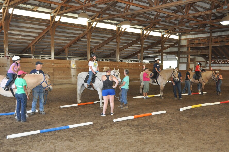 Kids from Team Fairchild line up their horses before embarking on a trail ride June 22, 2015, in Spokane, Wash. The Exceptional Family Member Program coordinated the horseback riding day camp with a local Hippotherapy facility in an effort to keep kids active in the summer. (U.S. Air Force photo/2nd Lt. Shelley Gregory)