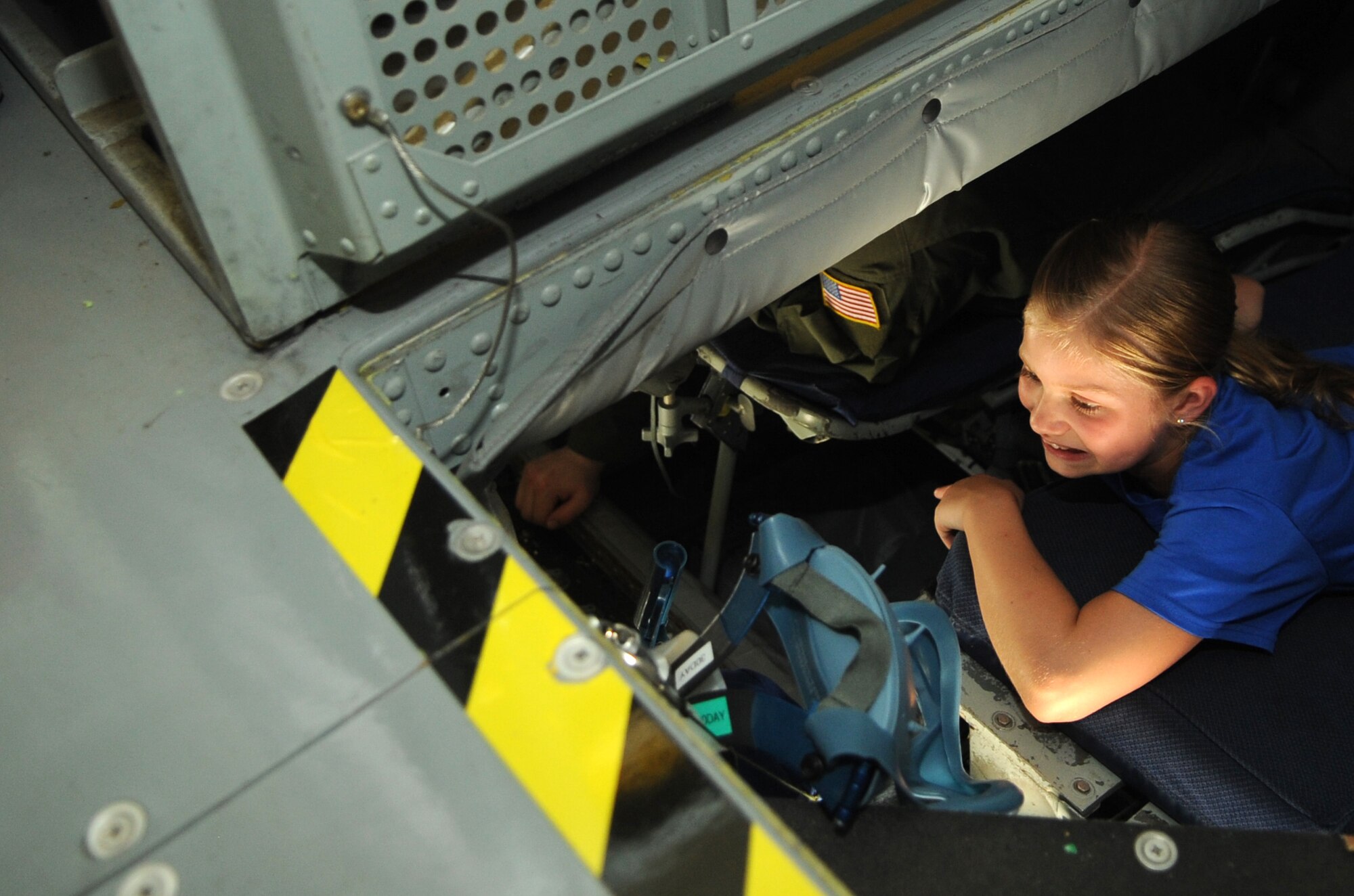 A Science and Technology Academies Reinforcing Basic Aviation and Space Exploration student marvels at the KC-135 Stratotanker’s capabilities, June 22, 2015, at Seymour Johnson Air Force Base, North Carolina. STARBASE 2015 was the first interaction with military personnel and inside look at military life for many of the 60 children that participated. (U.S. Air Force photo/Senior Airman Ashley J. Thum)