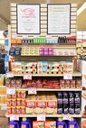 Single donation items picked specifically for the Feds Feeds Families program sit on a rack at the Malmstrom Air Force Base Commissary June 29. The Commissary offers a wide variety of items that customers can purchase to donate. (U.S. Air Force photo/Airman 1st Class Collin Schmidt) 