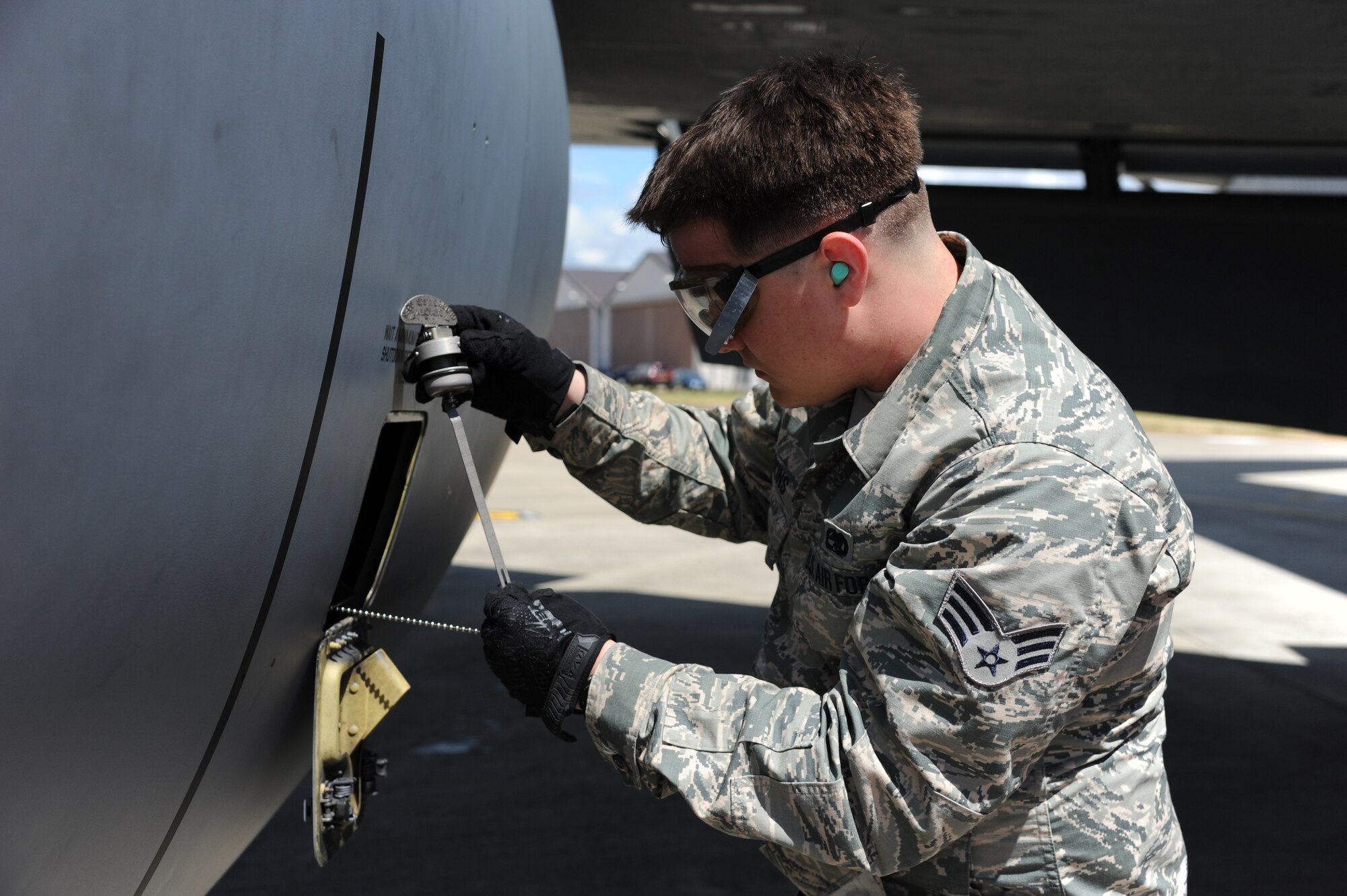 Senior Airman Brice Hawkins, 927 AMX, engine specialist, checks fluid levels during a recent deployment in support of Operation Atlantic Resolve. Two KC-135 Stratotankers along with more than 30 aircrew and maintenance personnel from the 927th Air Refueling Wing, MacDill Air Force Base, Fla., deployed to Royal air force Mildenhall, England in support of OAR, 17-30 June. (U.S. Air Force photo/ Tech. Sgt. Peter Dean)