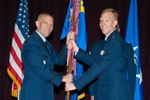Lt. Col. Nathan Leap assumed command of the Community College of the Air Force during a change of command ceremony at the Air Force Senior Noncommissioned Officer Academy, June 19, 2015. Leap assumed command of CCAF from Lt. Col. Michael Artelli.  (US Air Force photo by Melanie Rodgers Cox/Released)
