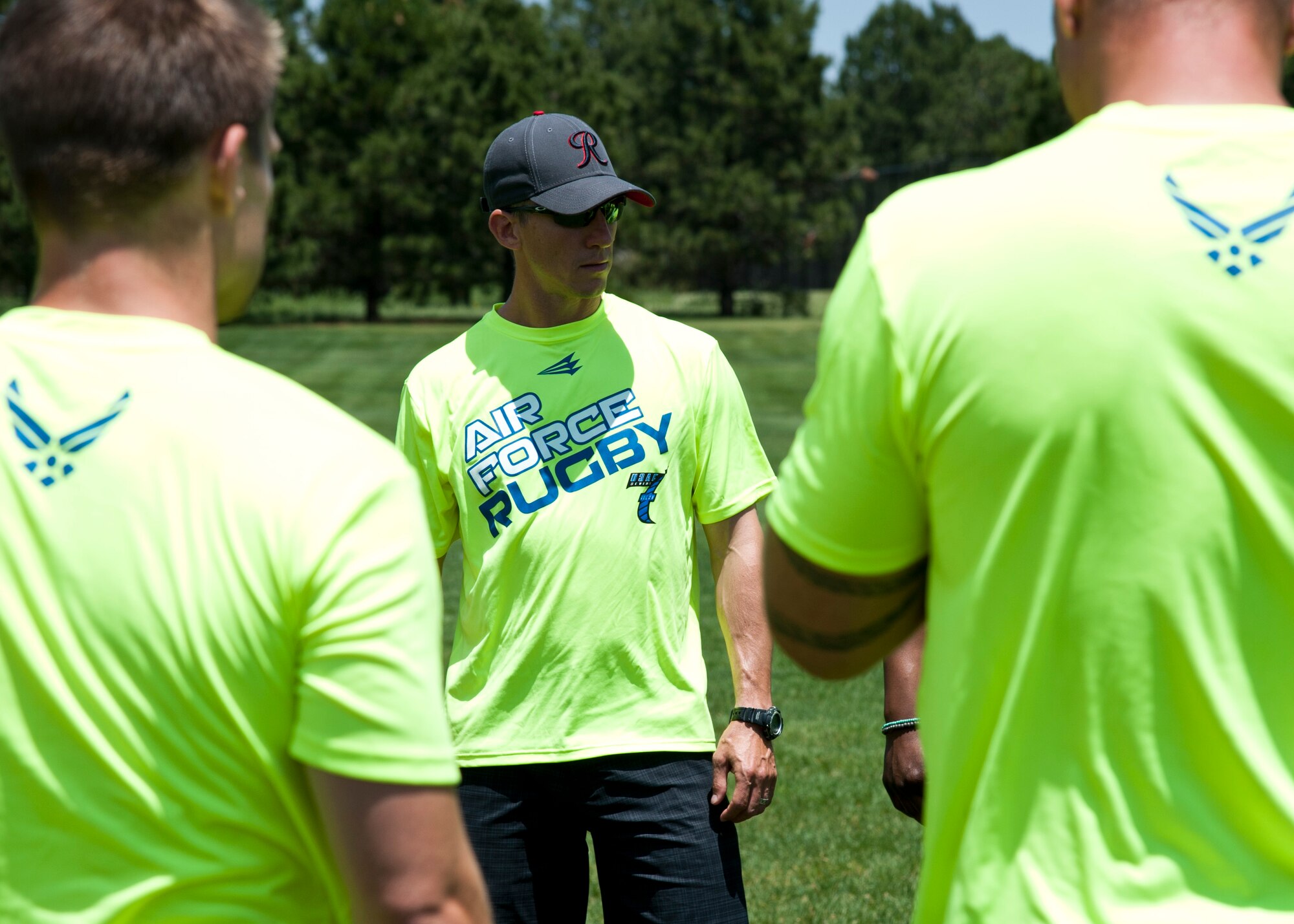 PETERSON AIR FORCE BASE, Colo. – Lt. Col. John McQuade, 627th Air Base Group deputy commander and the Air Force Men’s Rugby Sevens lead coach, discusses the team’s practice match at Patriot Park, June 25, 2015. McQuade has been playing rugby since 1998. He started playing for the Air Force Rugby team in 2002 and is on his fourth year coaching the AF team. (U.S. Air Force photo by Senior Airman Tiffany DeNault)