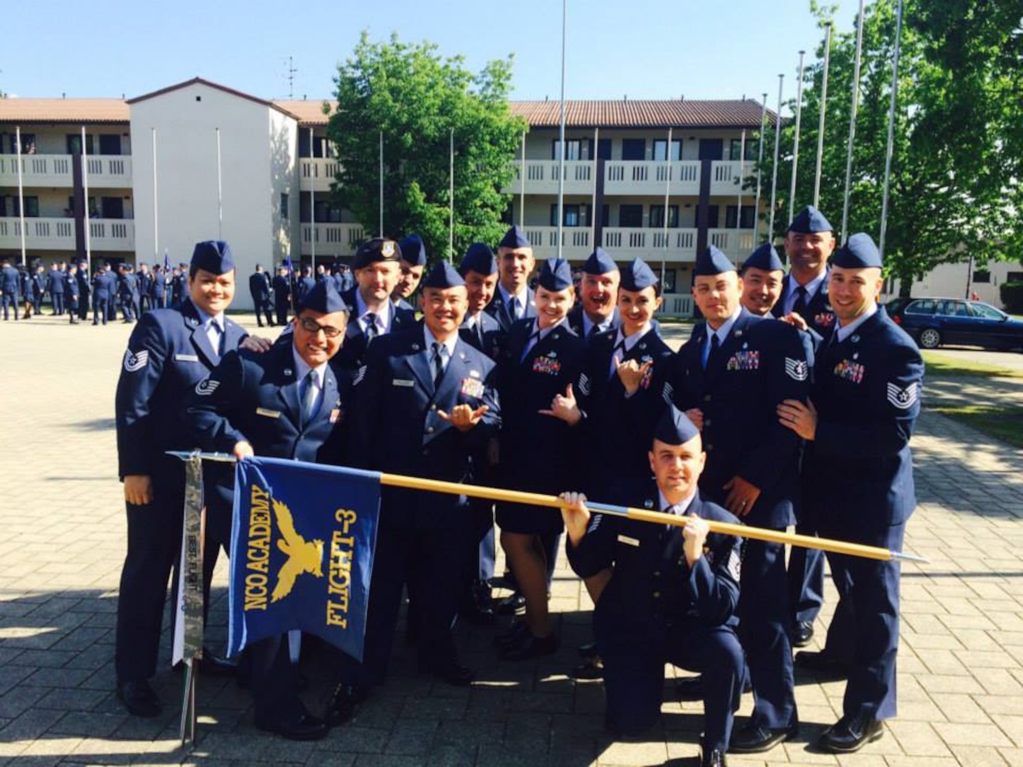 Thunderbolt flight, Class 15-4, pose for a photo before their final class retreat at the Kisling non-commissioned officer academy at Kapaun Air Station, Germany, May 21, 2015.  Class 15-4 is one of the last to complete the in-residence NCOA curriculum.  In-residence professional military education courses are undergoing changes that will require future participants to complete a distance education curriculum before earning a seat at in-residence non-commissioned officer academies around the world.  (Courtesy Photo from Kisling Non-Commissioned Officer Academy/Released)