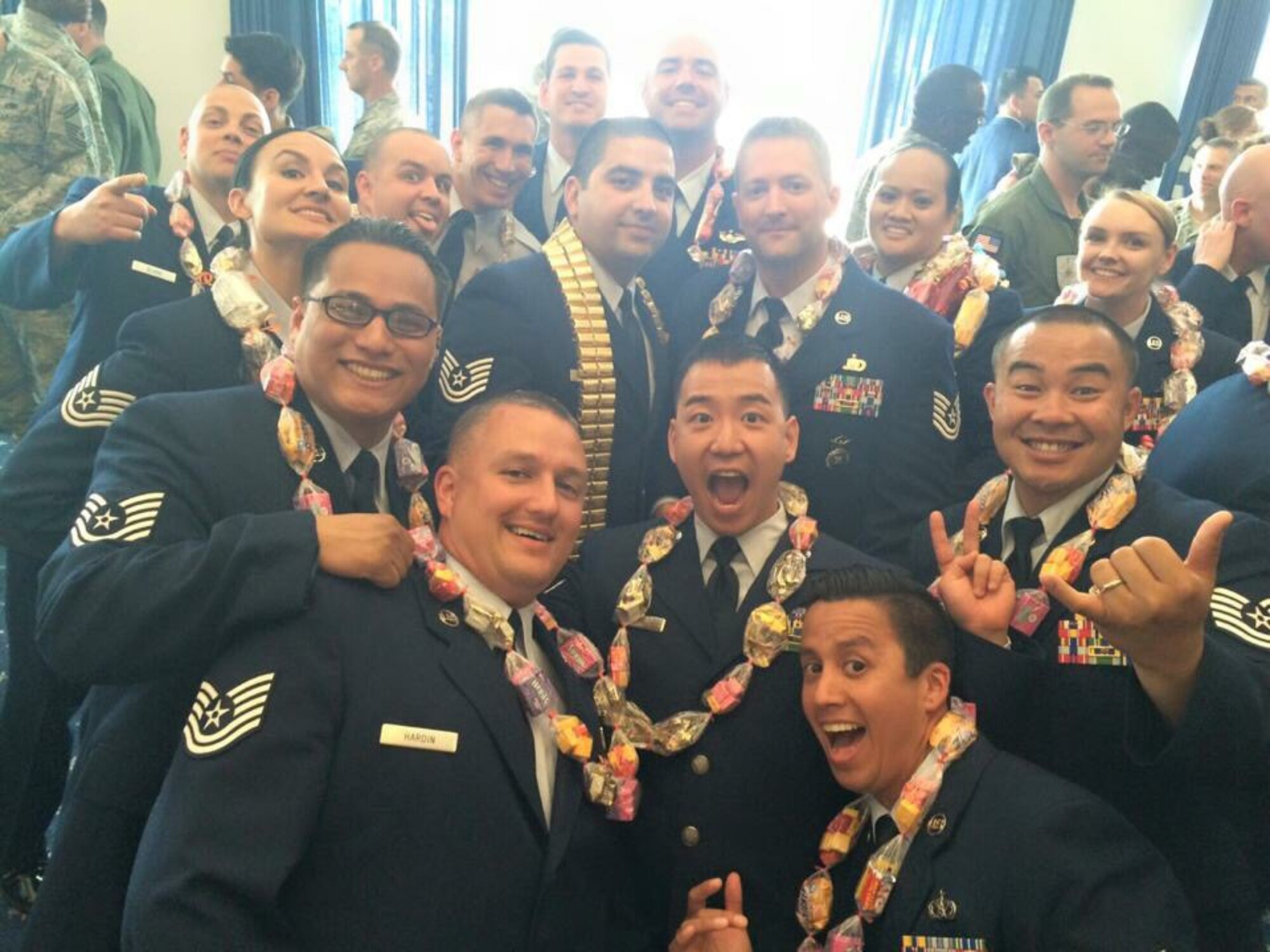 Tech. Sergeants from Thunderbolt flight, Class 15-4, pose for a class photo on graduation day from the Kisling Non-Commissioned Officer Academy, Kapaun Air Station, Germany, May 21, 2015.  In-residence professional military education courses are undergoing changes that will require future participants to complete a distance education curriculum before earning a seat at in-residence, non-commissioned officer academies around the world. (Courtesy photo by Sophie Hunt/Released)