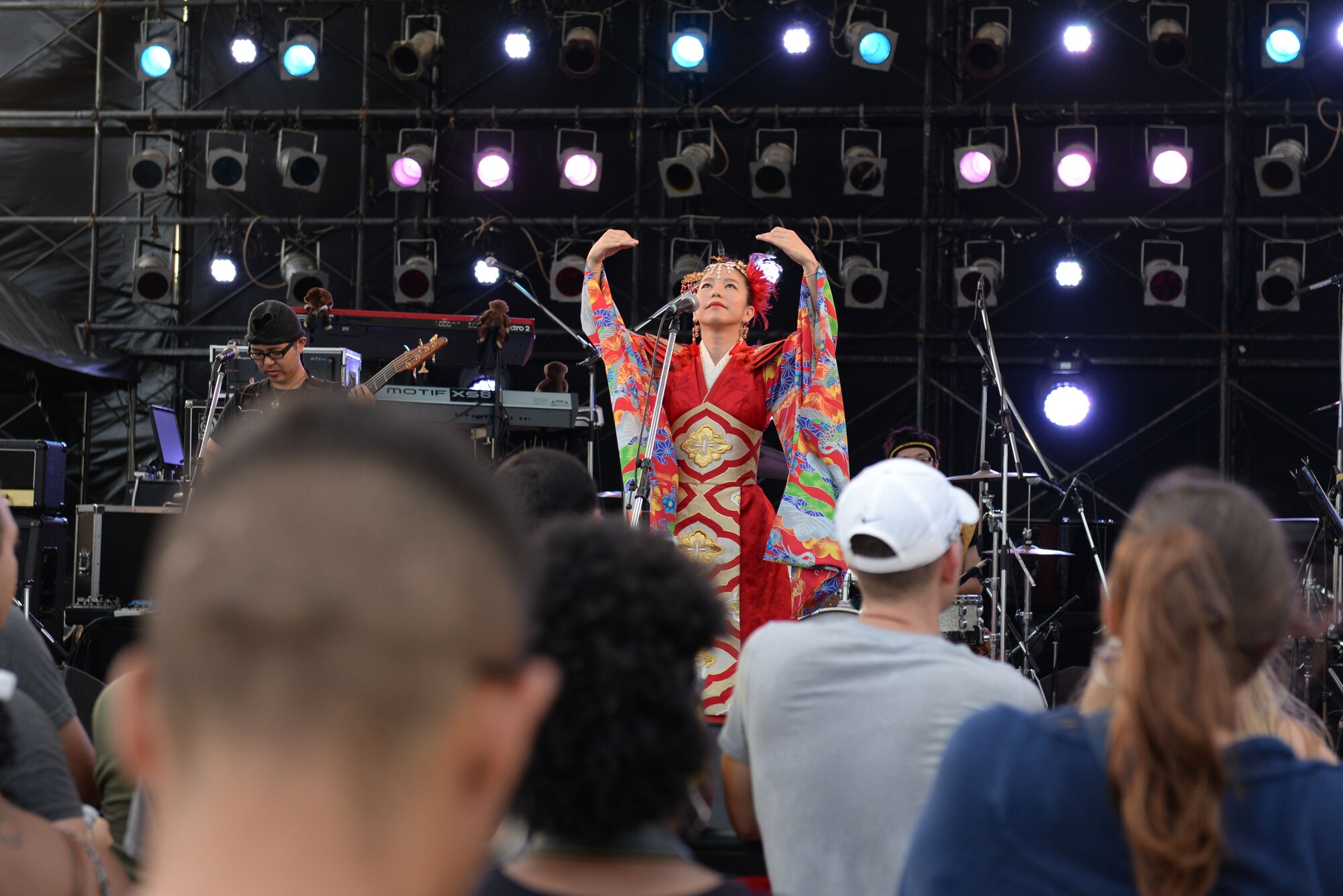 The Ryukyu Chimdon Gakudan group performs during the 18th Force Support Squadron’s Rockin’ the Block on Kadena Air Base, Japan, June 27, 2015. The event featured live music, crafts, food and prize drawings. The band played jazz and popular U.S. songs from the 90s. (U.S. Air Force photo by Senior Airman Omari Bernard)