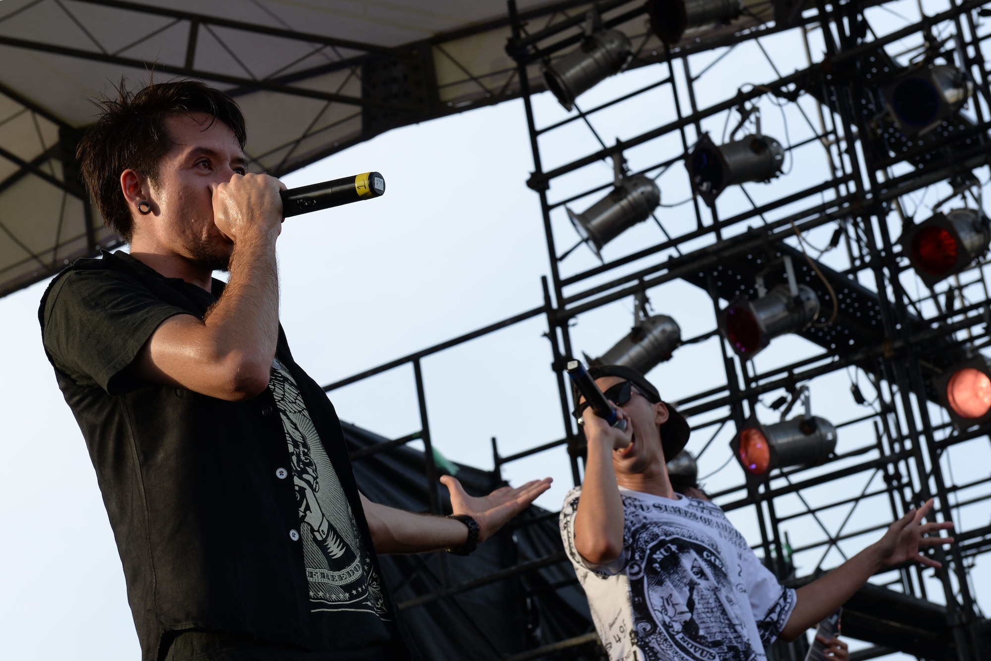 AS Alliance, a Japanese rock band, performs during the 18th Force Support Squadron’s Rockin’ the Block on Kadena Air Base, Japan, June 27, 2015. The event featured live music, crafts, food and prize drawings. Rockin’ the Block was open to Status of Forces Agreement personnel and their families. (U.S. Air Force photo by Senior Airman Omari Bernard)