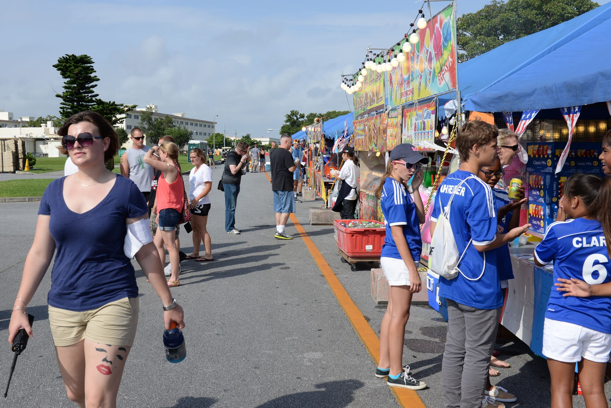 Status of Forces Agreement personnel and their families attend the 18th Force Support Squadron's Rockin' the Block on Kadena Air Base, Japan, June 27, 2015. The event featured performances by local artists and was headlined by Gavin Degraw. (U.S. Air Force photo by Senior Airman Omari Bernard)