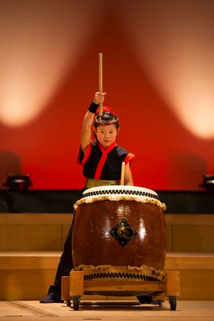 A member of the Domu, Otake City Japanese Drums Organization performs during the 2015 U.S.-Japan Friendship Concert inside the Sinfonia Iwakuni Concert Hall, Iwakuni City, Japan, Feb. 14, 2015. The purpose behind the event was to provide an opportunity for interaction between local residents and U.S. military members and build bonds through music.
