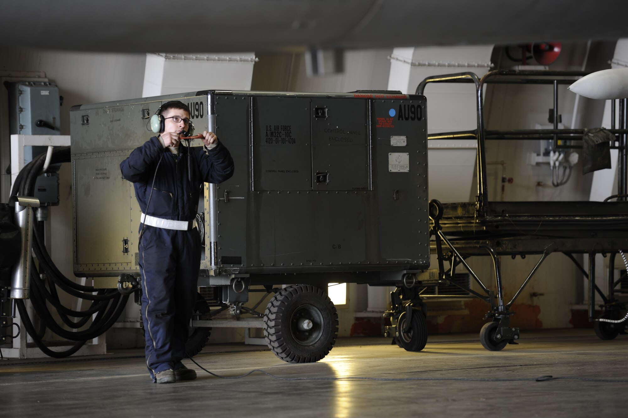 U.S. Air Force Airman 1st Class Jacob Dudley, 35th Aircraft Maintenance Squadron crew chief, conducts a pre-flight inspection at Misawa Air Base, Japan, March 1, 2015. Crew chiefs ensure aircraft have been properly serviced with fuel, hydraulic fluid, liquid oxygen and other maintenance items prior to flight. Dudley performed this inspection on an F-16 Fighting Falcon as part of exercise Beverly Sunrise 15-2. (U.S. Air Force photo by Airman 1st Class Jordyn Rucker/Released)