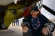 Retired Air National Guard Chief Warrant Officer 2 Robert Hertel, laughs while under the wing of a P-47 Thunderbolt during the Heritage Flight Training and Certification Course at Davis-Monthan Air Force Base, Ariz., Feb. 28, 2015. Hertel, a 92-year-old  World War II veteran, was given the opportunity to visit the aircraft he used to fly. (U.S. Air Force photo by Senior Airman Jensen Stidham/Released)