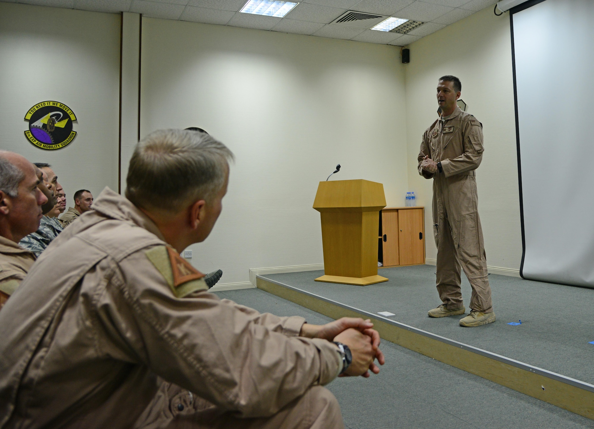 U.S. Air Force Lt. Col. Byron Newell, 746th Expeditionary Airlift Squadron commander, gives remarks after assuming command of his new squadron during a change of command ceremony, March 1, 2015, at Al Udeid Air Base, Qatar. Newell assumed command of the 746th from Lt. Col. Jeremy Schaad who is returning to his home unit, the 153rd Airlift Wing in Cheyenne, Wyo. (U.S. Air Force photo by Senior Airman Kia Atkins)