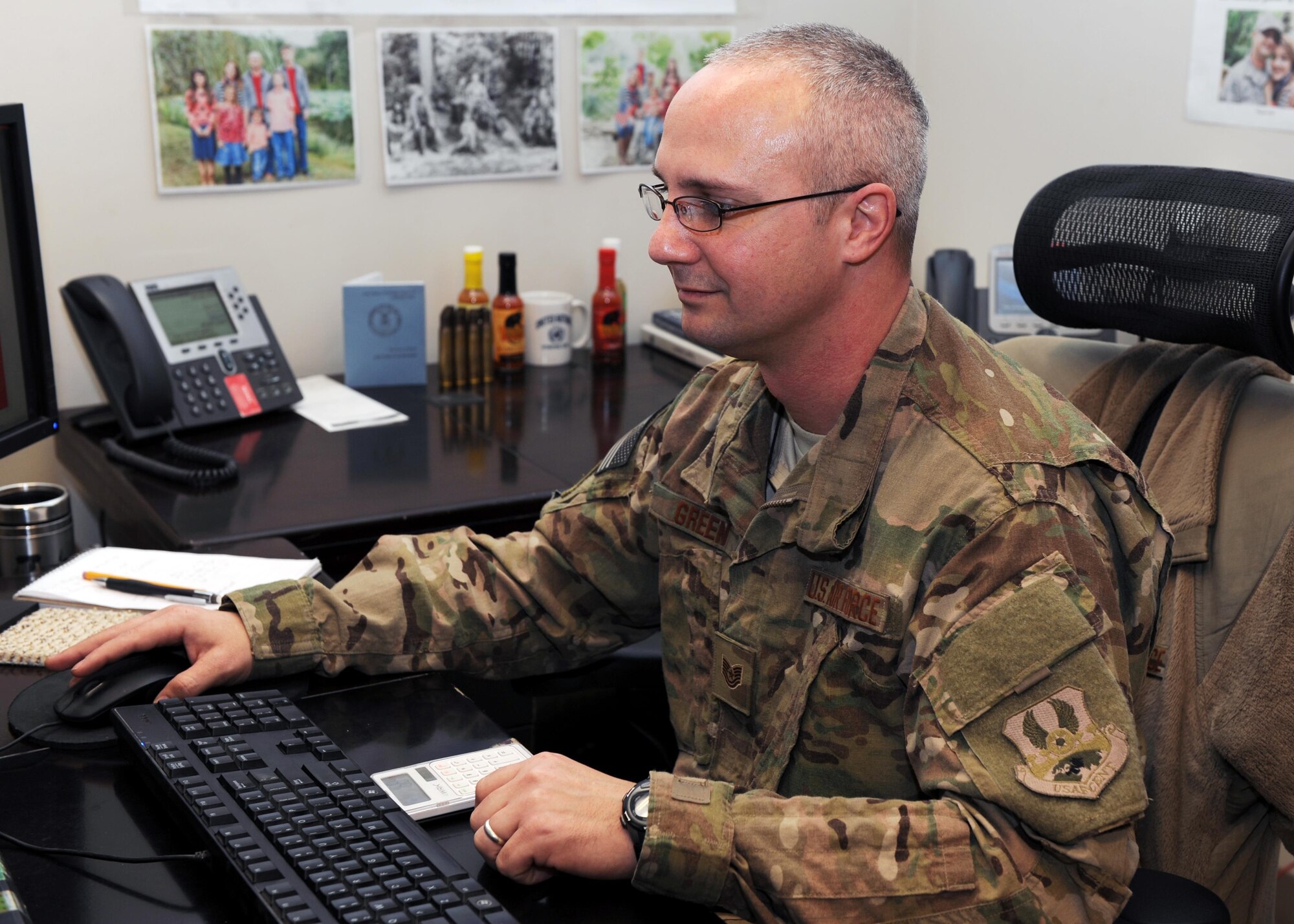Tech. Sgt. Gregory Green analyzes spreadsheets Feb. 12, 2015, at Bagram Air Field, Afghanistan. Green is a 455th Expeditionary Force Support Squadron manpower analyst. As a one-deep analyst in the only Air Force manpower office in Afghanistan, Green provides personnel retention and reduction recommendations to commanders across the wing. (U.S. Air Force photo/Staff Sgt. Whitney Amstutz)
