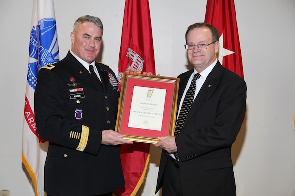 Brig. Gen. Richard Kaiser inducts Steve Durrett into the Senior Executive Service at a ceremony at the Mazzoli Federal Building, Louisville, Kentucky.