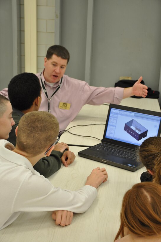 Jeremy Nichols, structural engineer, demonstrates Building Information Modeling to students at Scott Middle School, Fort Knox, Ky.
