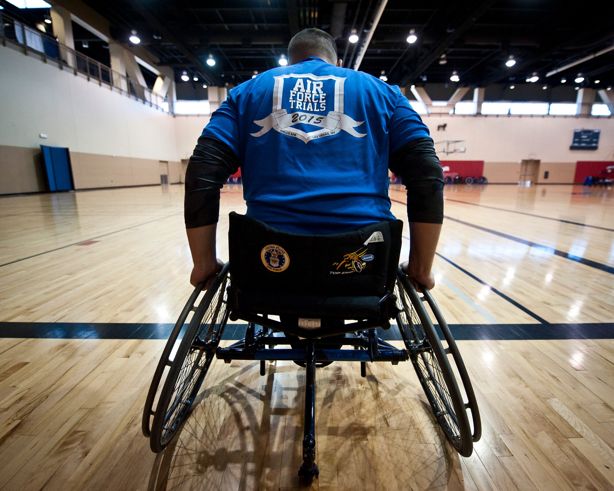 Retired U.S. Air Force Master Sgt. Phillip Sisneros, 2015 U.S. Air Force Trials participant, prepares for wheel chair sprints during a wheelchair basketball team practice at Nellis Air Force Base, Nev., Feb. 26, 2015. More than 100 wounded, ill or injured service men and women from around the U.S., the United Kingdom and Australia will compete during the trials. (U.S. Air Force photo by Staff Sgt. Siuta B. Ika)