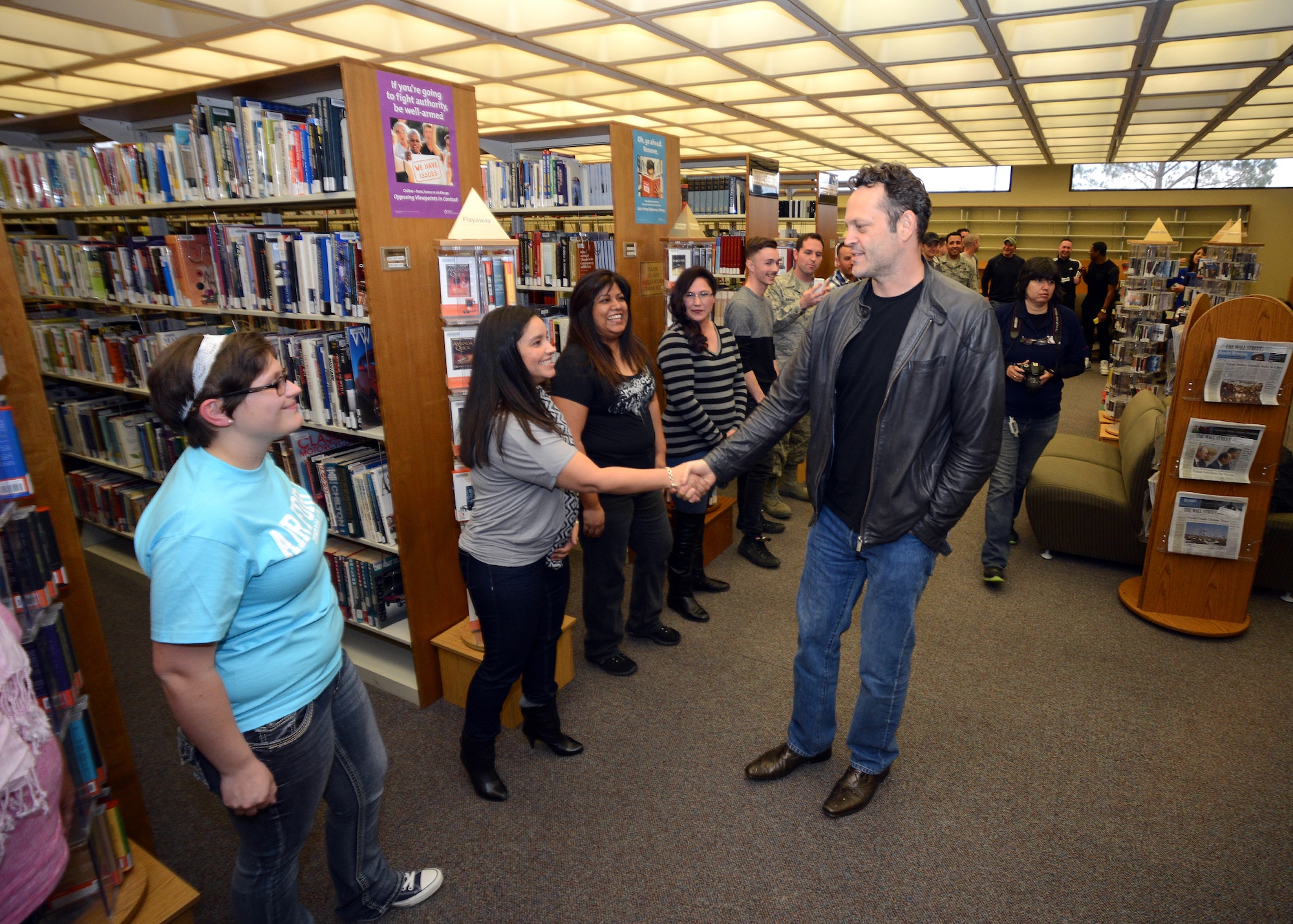 Actor Vince Vaughn meets with Edwards Airmen and their families at the base library before introducing an advance screening of his new movie, "Unfinished Business," at the base theater Feb. 28. (U.S. Air Force photo by Jet Fabara)