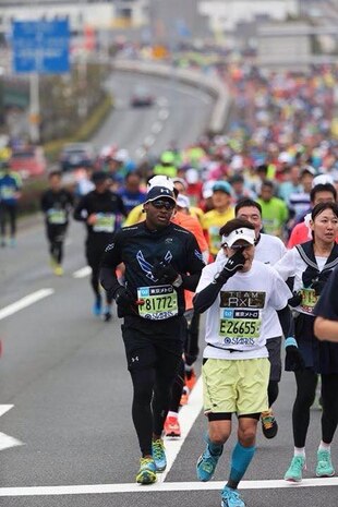 U.S. Air Force Tech. Sgt. Gerard Tilley, 35th Maintenance Group education and training manager, nears the 23-mile marker during the Tokyo Marathon, in Tokyo, Japan, Feb. 22, 2015.  Tokyo Marathon participants are selected by lottery, and only 10 percent of applicants are selected for the event. Tilley finished the race in 4:00.31. (U.S. Air Force photo by Tech. Sgt. April Quintanilla)