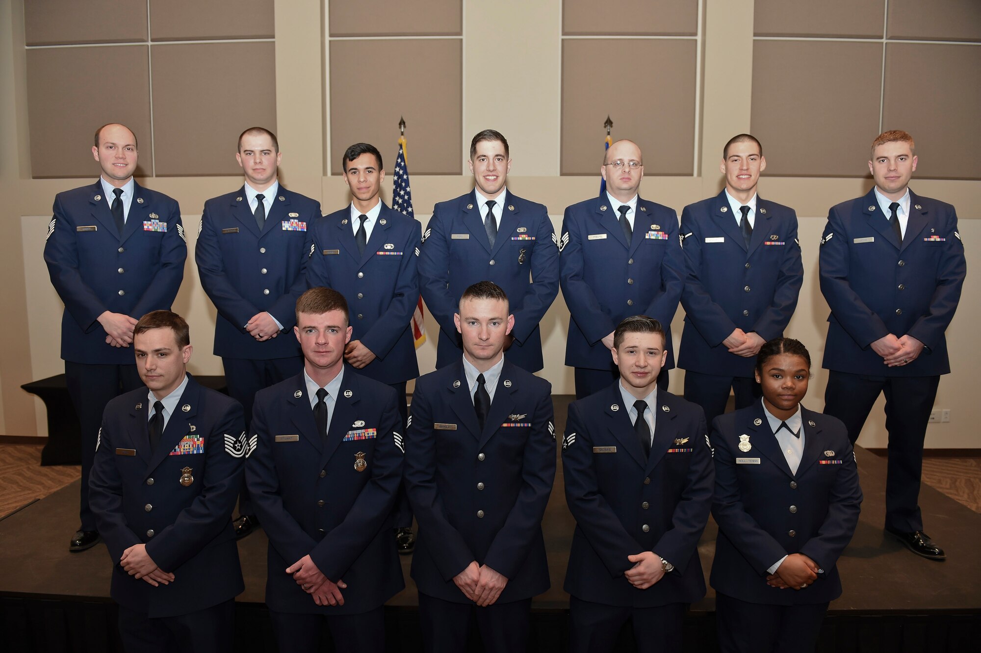 Team Buckley members were promoted to their next ranks March 2, 2015, at the Leadership Development Center on Buckley Air Force Base, Colo. A promotion ceremony is a time-honored tradition in the Air Force, allowing co-workers, family and friends to support and congratulate Airmen on their promotion.  (U.S. Air Force photo by Airman 1st Class Samantha Saulsbury/Released)
