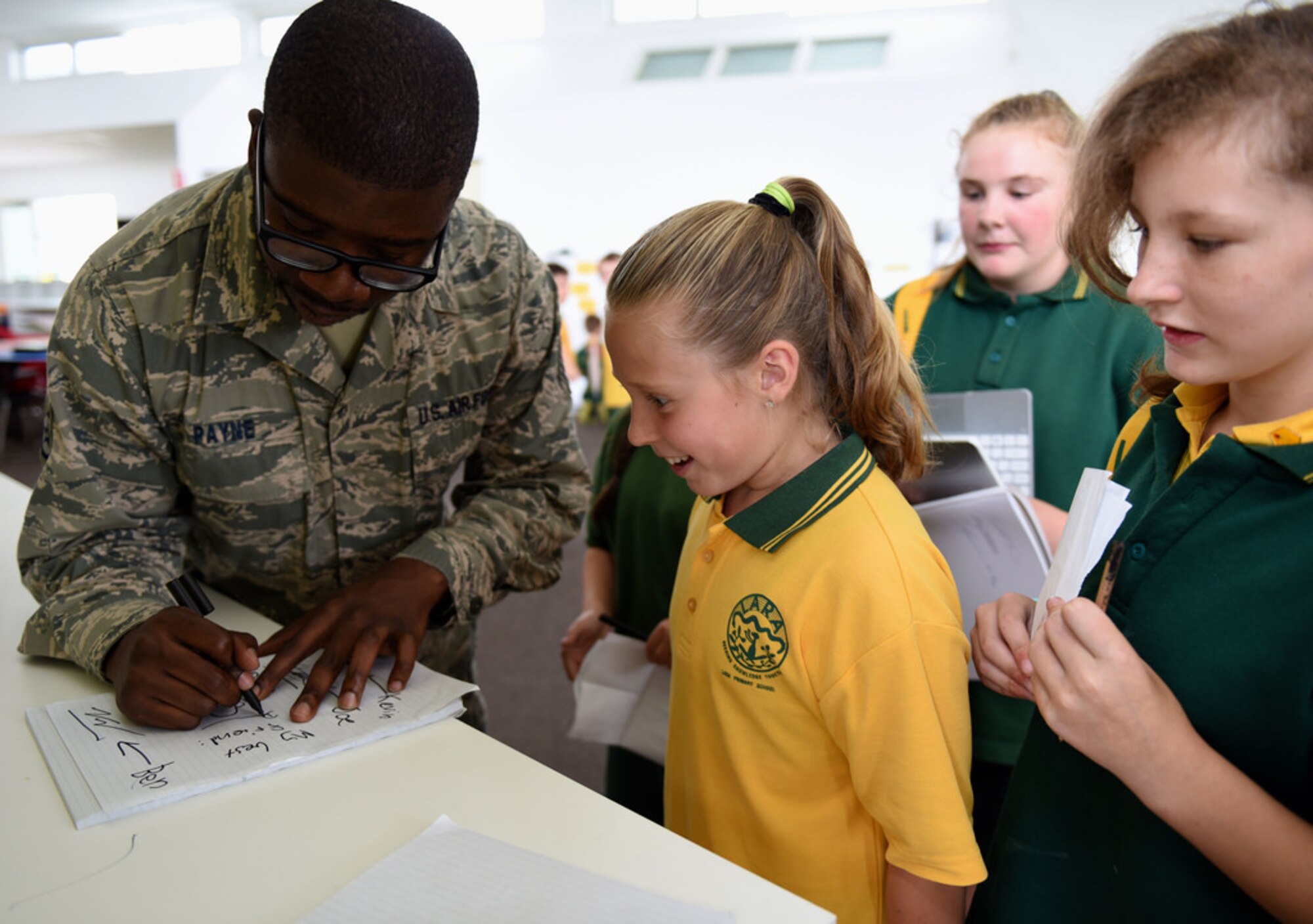 Crew members from a U.S. Air Force B-52 Stratofortress bomber interact with students at Lara Primary School, Feb. 25, 2015, Melbourne, Australia. The crew is in town for the 2015 Australian International Airshow and Aerospace & Defense Exposition at Avalon Airport, Australia, showcasing the capabilities of U.S. air assets. (Courtesy of the U.S. Consulate)