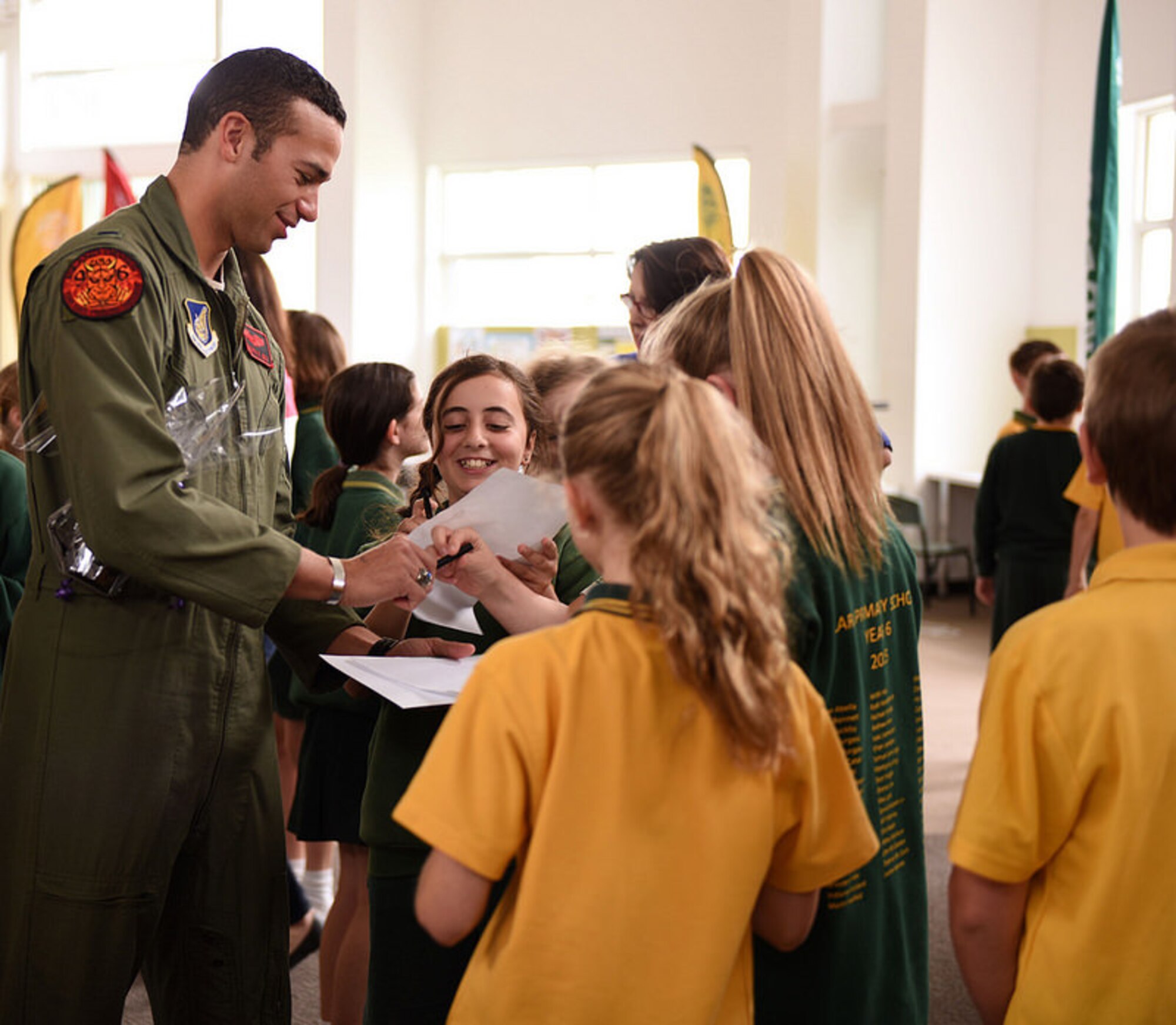 Crew members from a U.S. Air Force B-52 Stratofortress bomber interact with students at Lara Primary School, Feb. 25, 2015, Melbourne, Australia. The crew is in town for the 2015 Australian International Airshow and Aerospace & Defense Exposition at Avalon Airport, Australia, showcasing the capabilities of U.S. air assets. (Courtesy of the U.S. Consulate)