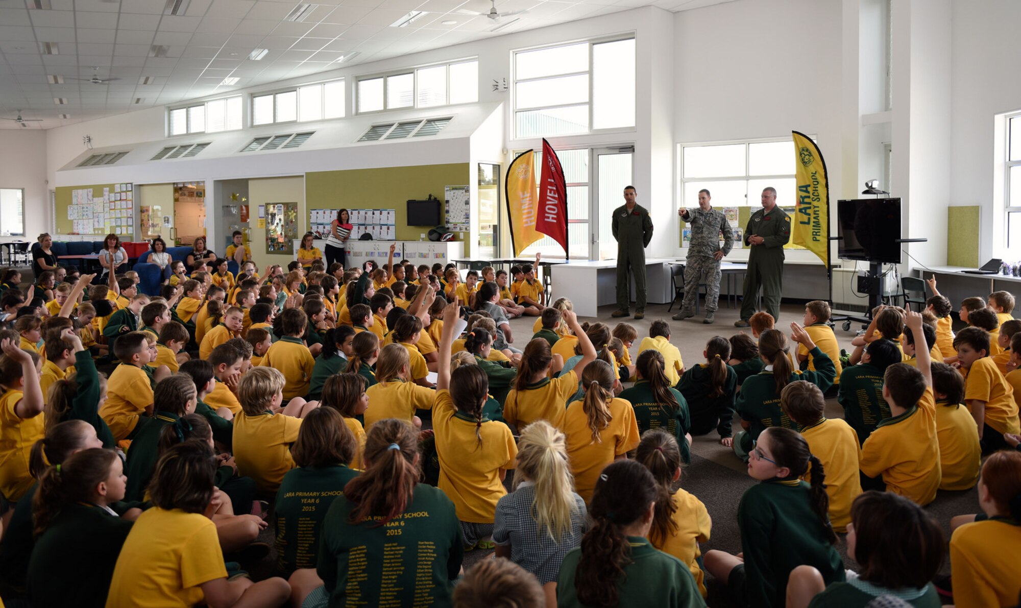 Crew members from a U.S. Air Force B-52 Stratofortress bomber interact with students at Lara Primary School, Feb. 25, 2015, Melbourne, Australia. The crew is in town for the 2015 Australian International Airshow and Aerospace & Defense Exposition at Avalon Airport, Australia, showcasing the capabilities of U.S. air assets. (Courtesy of the U.S. Consulate)