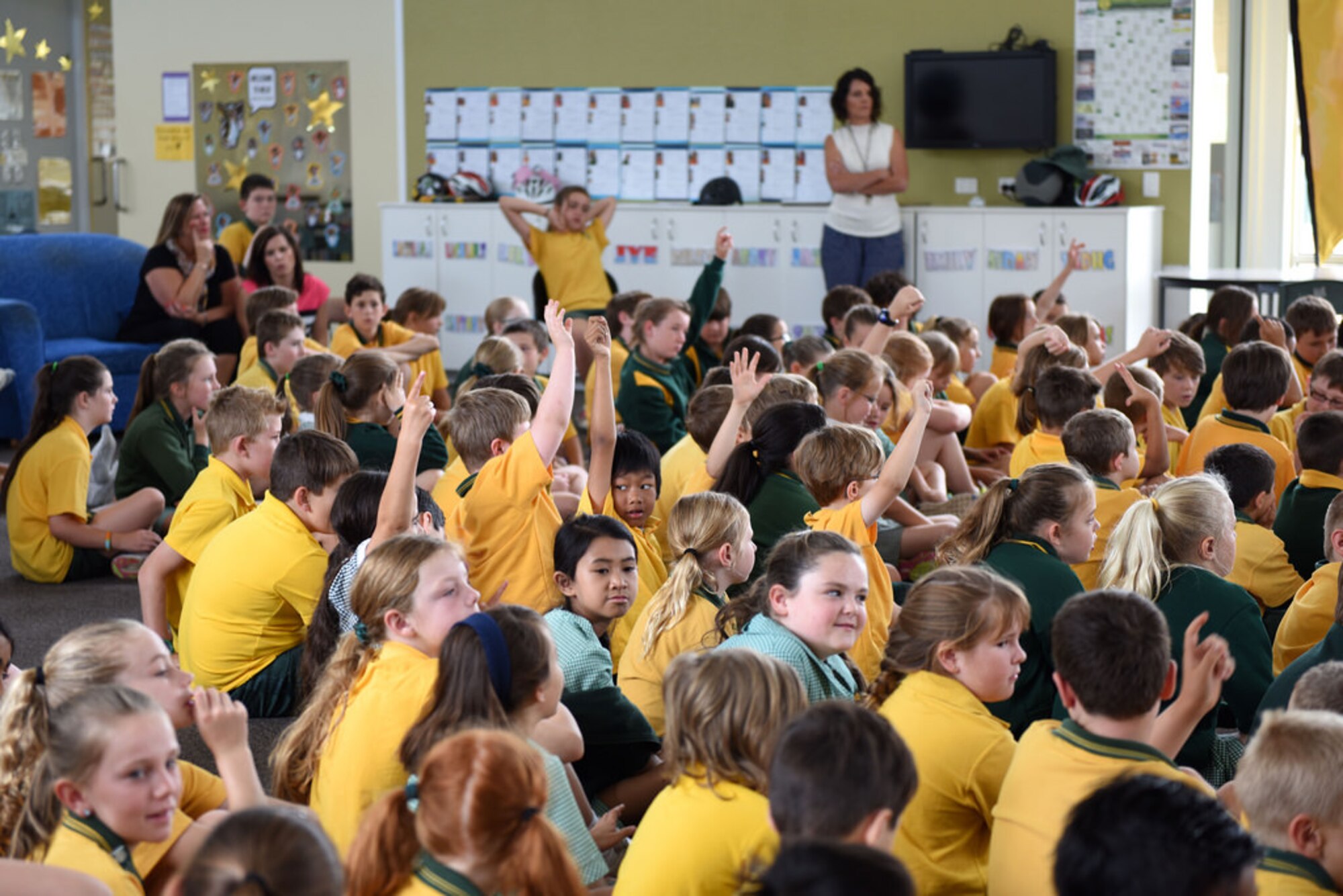 Crew members from a U.S. Air Force B-52 Stratofortress bomber interact with students at Lara Primary School, Feb. 25, 2015, Melbourne, Australia. The crew is in town for the 2015 Australian International Airshow and Aerospace & Defense Exposition at Avalon Airport, Australia, showcasing the capabilities of U.S. air assets. (Courtesy of the U.S. Consulate)