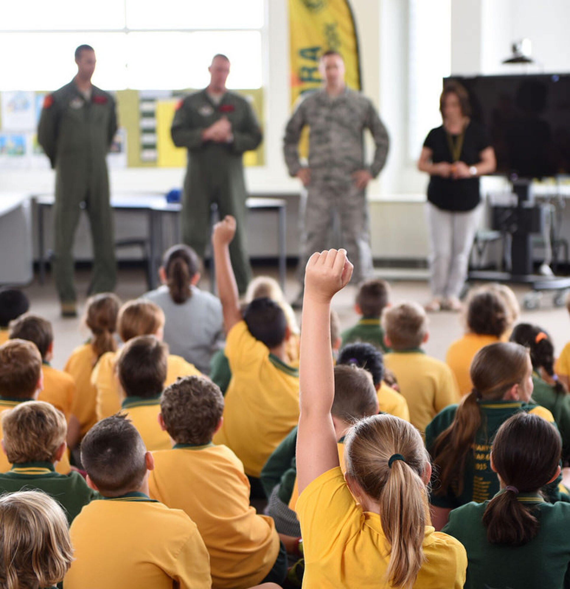 Crew members from a U.S. Air Force B-52 Stratofortress bomber interact with students at Lara Primary School, Feb. 25, 2015, Melbourne, Australia. The crew is in town for the 2015 Australian International Airshow and Aerospace & Defense Exposition at Avalon Airport, Australia, showcasing the capabilities of U.S. air assets. (Courtesy of the U.S. Consulate)