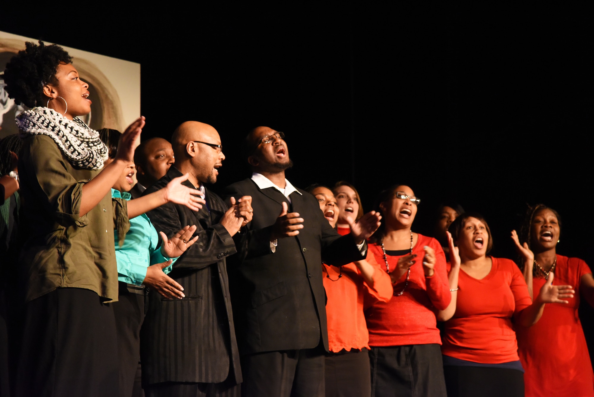 Members of the Alexander Temple Church of God Choir sing during the opening act of the University of Great Fall’s “What Kind of History Will You Leave” production Feb. 26. The production was hosted in celebration of Black History Month. (U.S. Air Force photo/Airman 1st Class Collin Schmidt)  